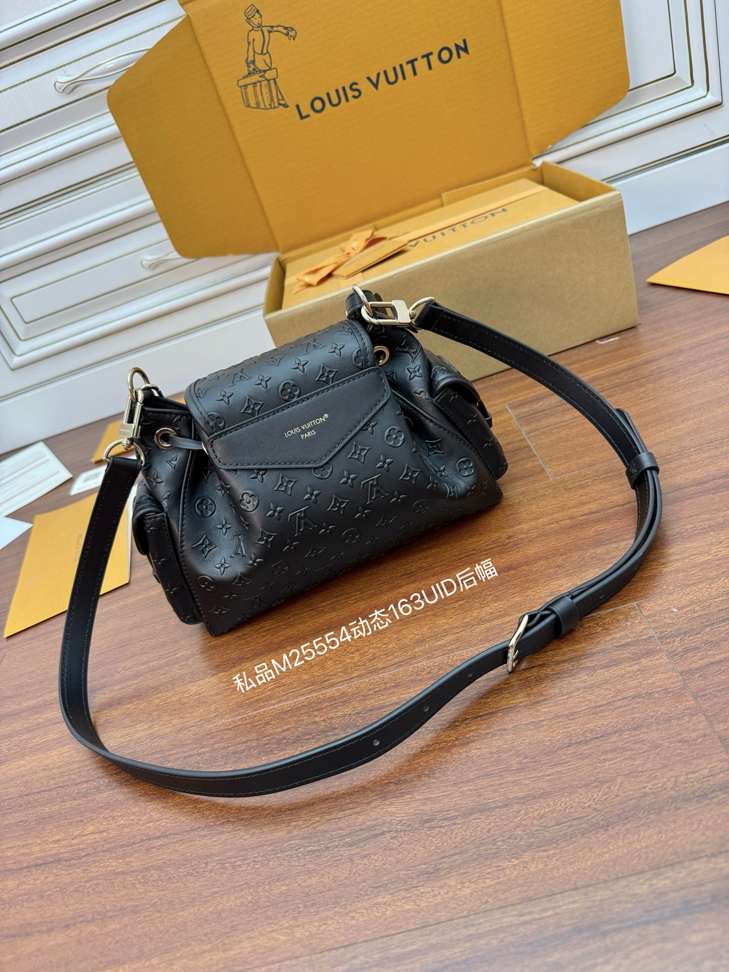 Louis Vuitton Black Leather Embossed Monogram Drawstring Shoulder Bag 5 i1752463985391 5111 0 3