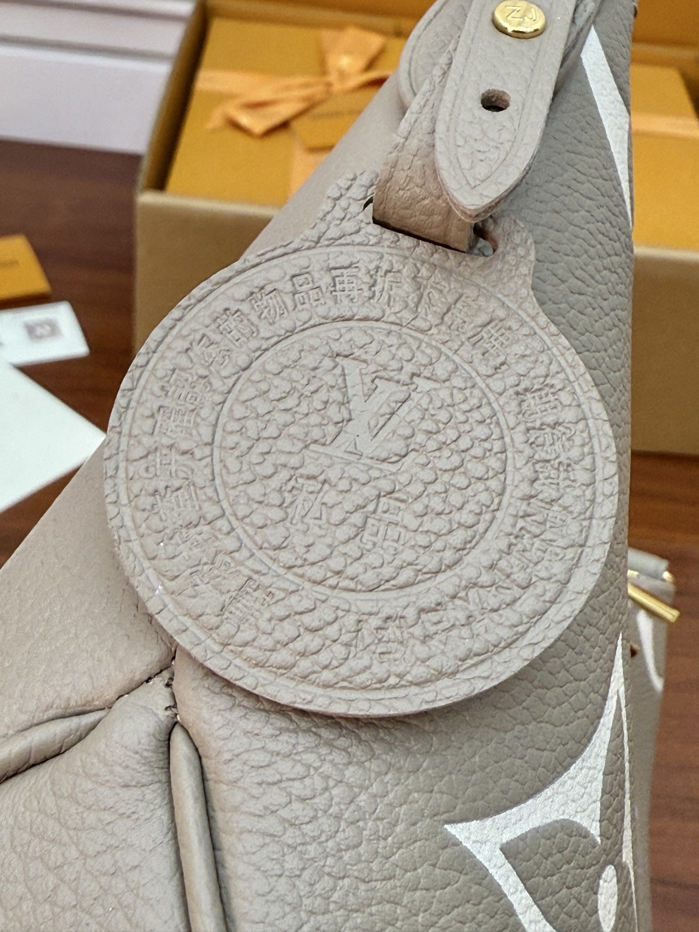 Louis Vuitton Loop Hobo Bag in Turtledove Monogram Coated Canvas 11 i1754105270772 8986 0 9