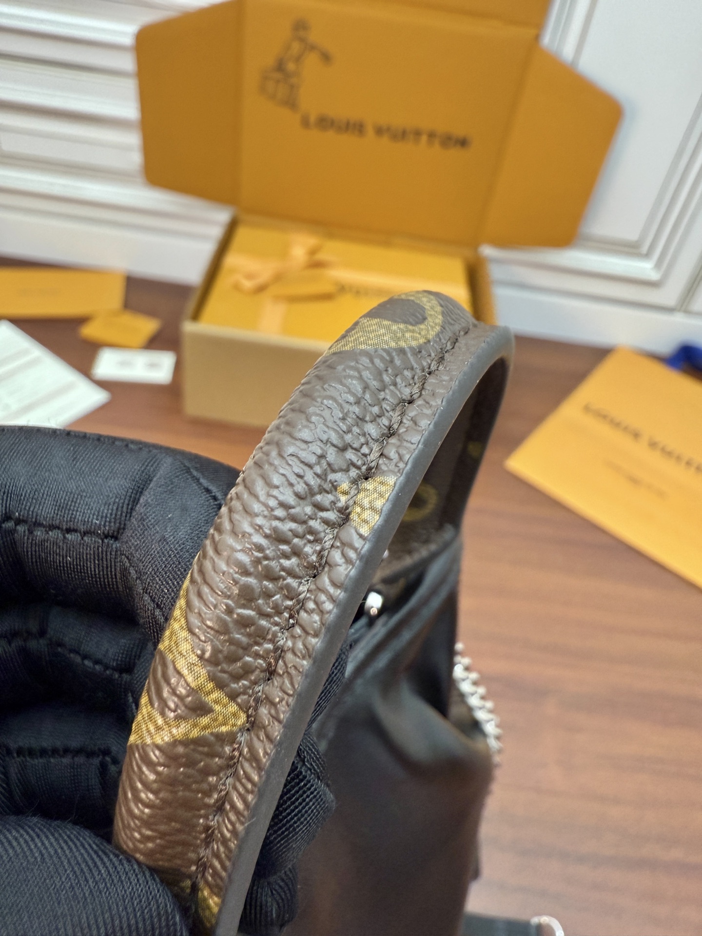 Louis Vuitton Black Leather Drawstring Bucket Bag with Chain Accent 6 i1756782610943 4592 0 4