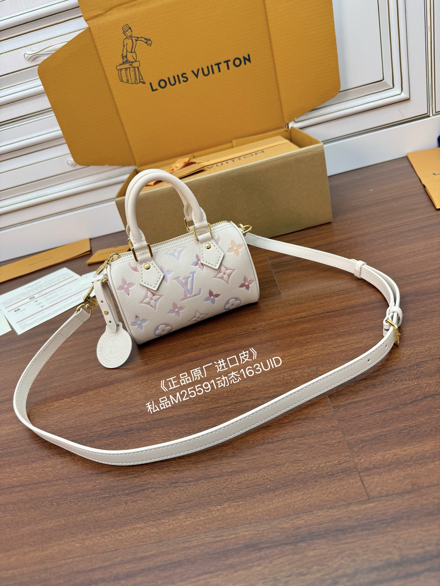 Louis Vuitton Monogram Empreinte Leather Nano Speedy Bag with Strap 2 i1758339802981 4683 0 0