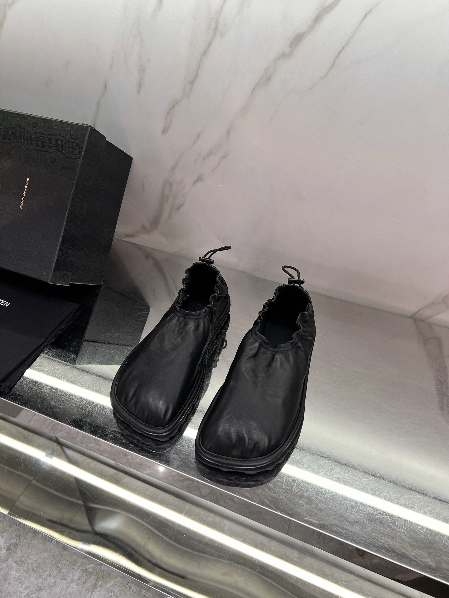 Fashion Forecast 2025: Glamorous and Cosmopolitan Collection by Dries Van Noten