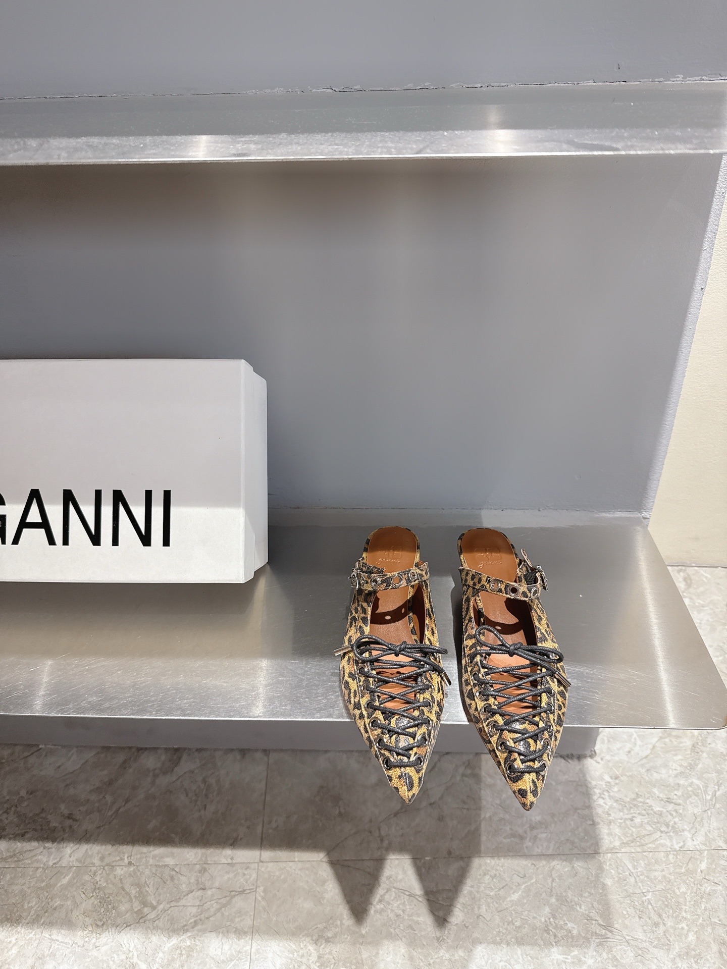 GANNI Spring/Summer ’25: Derby Shoes Love, Classic Black and White, Red Soles.