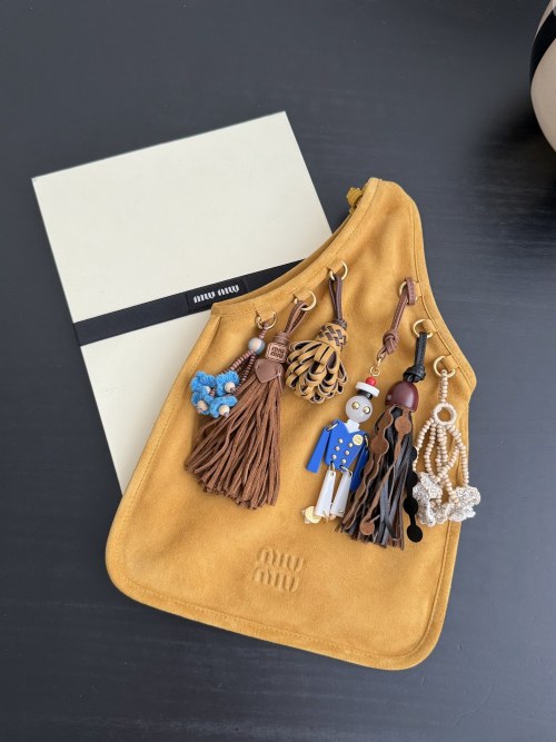 Miu Miu Suede Shoulder Bag with Tassel Charms - Ginger Yellow 1 Miu Miu Suede Shoulder Bag with Tassel Charms - Ginger Yellow