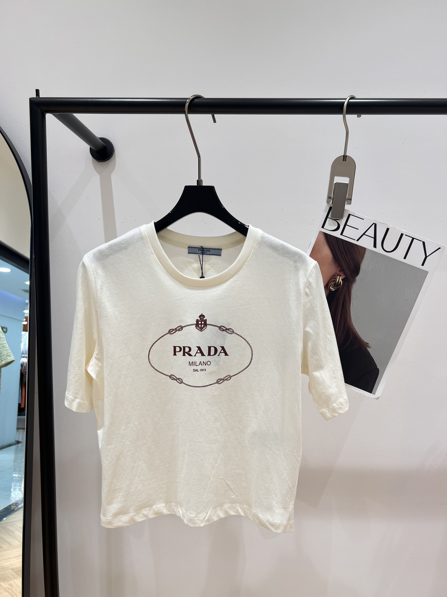 Acheter vendre
 Prada Vêtements T-Shirt en ligne
 Imprimé Série d’été
