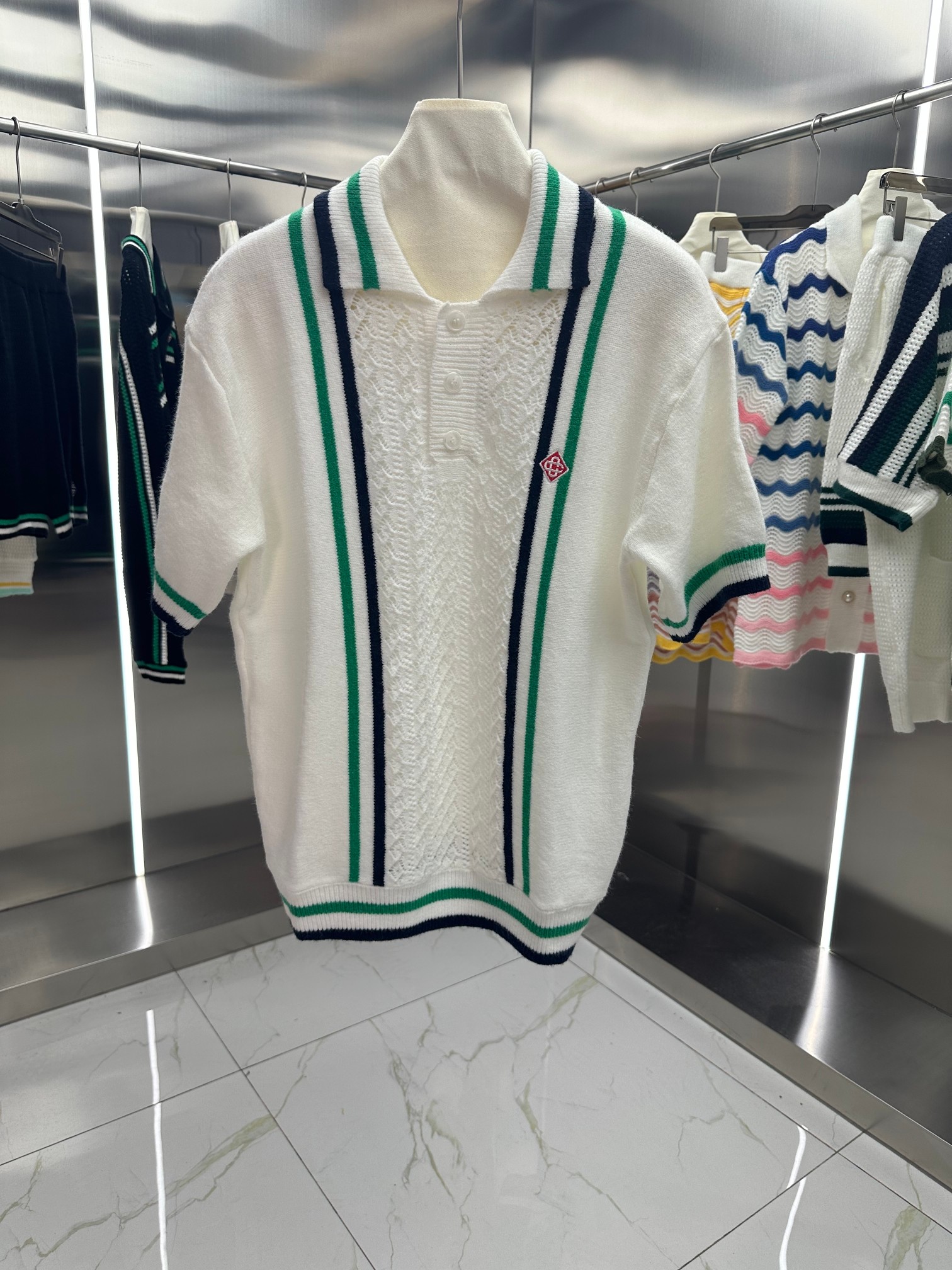 2024Casa primavera/verano nuevo conjunto de punto tejido con bordado jacquard y cuello vuelto, manga corta, unisex de m…