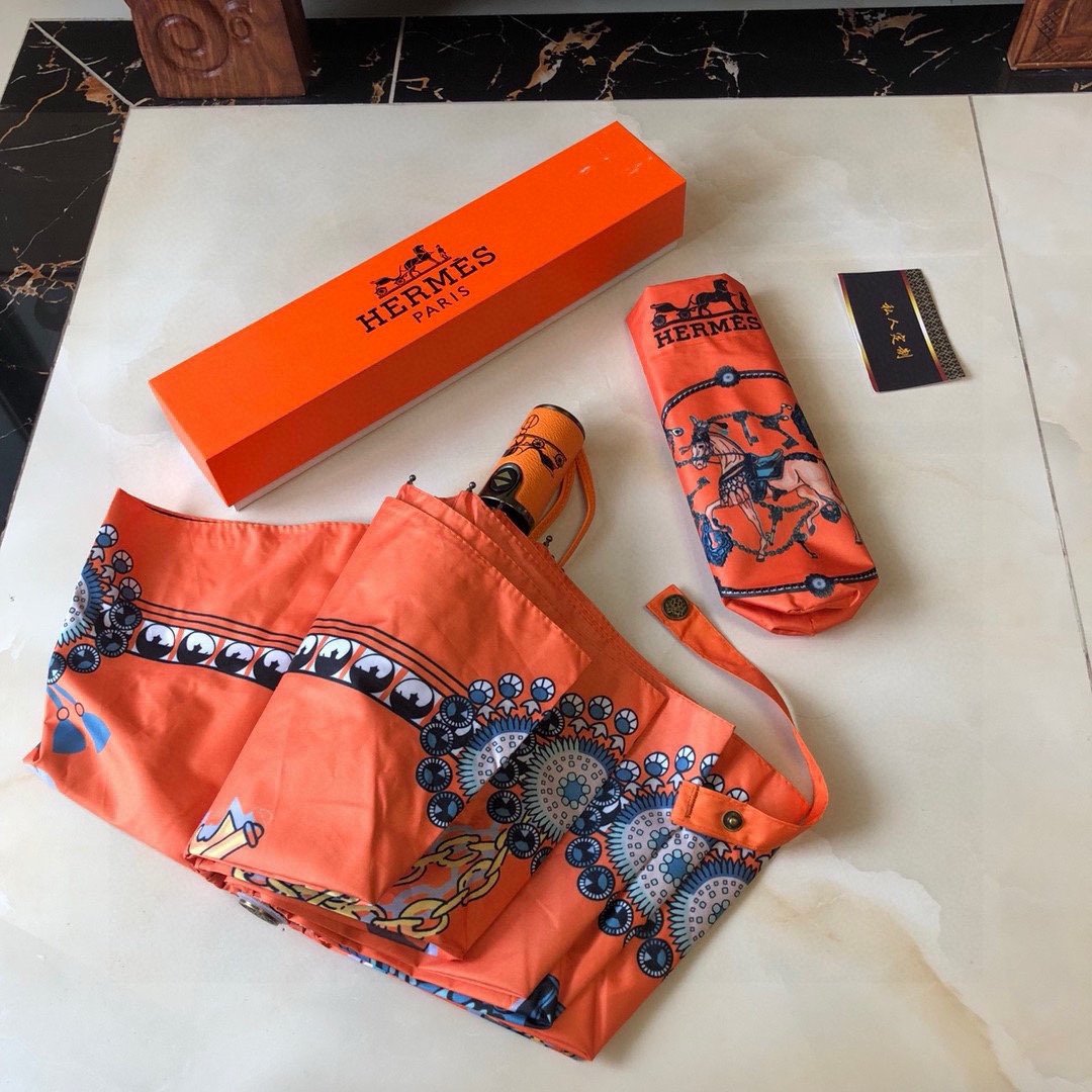 爱马仕Hermès经典橙极品H家三折自动伞重磅呈现以其精湛的工艺技术和源源不断的想像力新涂层技术伞布带来