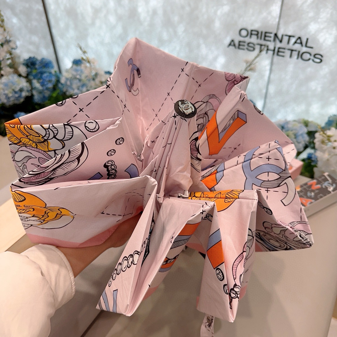  CHANEL（香奈儿） 玫瑰花头手柄 三折自动折叠晴雨伞    阻隔99%直射伞面的紫外线 杜绝夏季晒