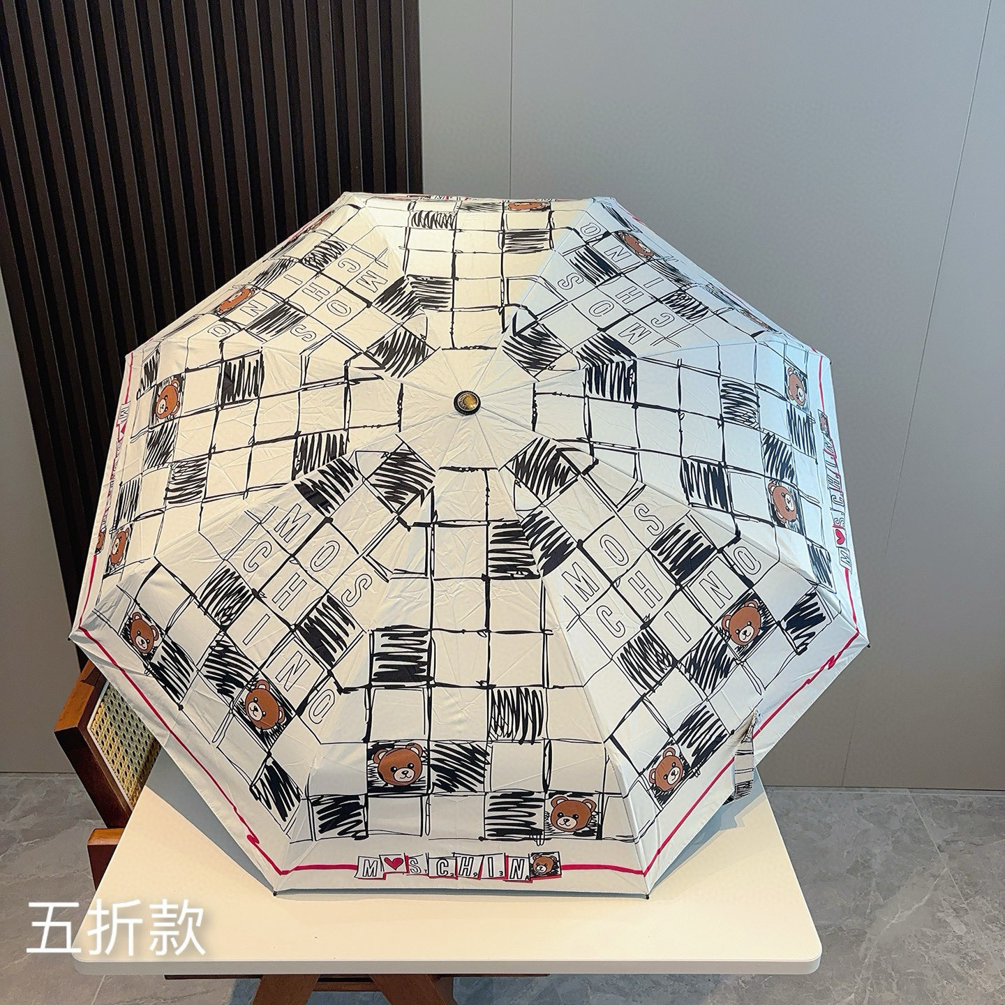  Moschino（莫斯奇诺）熊头柄 五折手开伞设计师Franco Moschino以自己的名字命名的一
