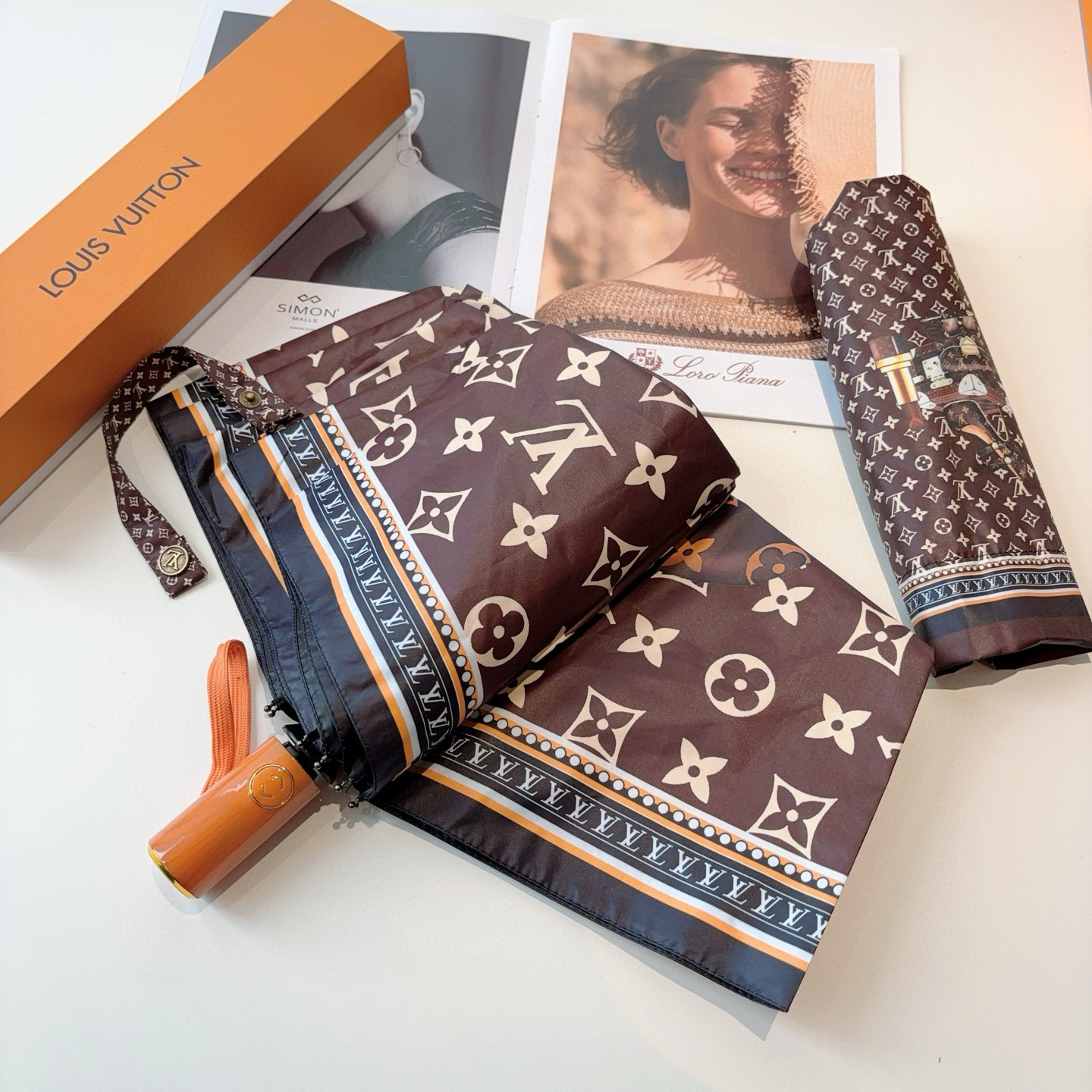 LOUIS VUITTON （路易威登）新款 三折自动折叠晴雨伞 新涂层技术深色伞面 拥有令人惊喜的遮光