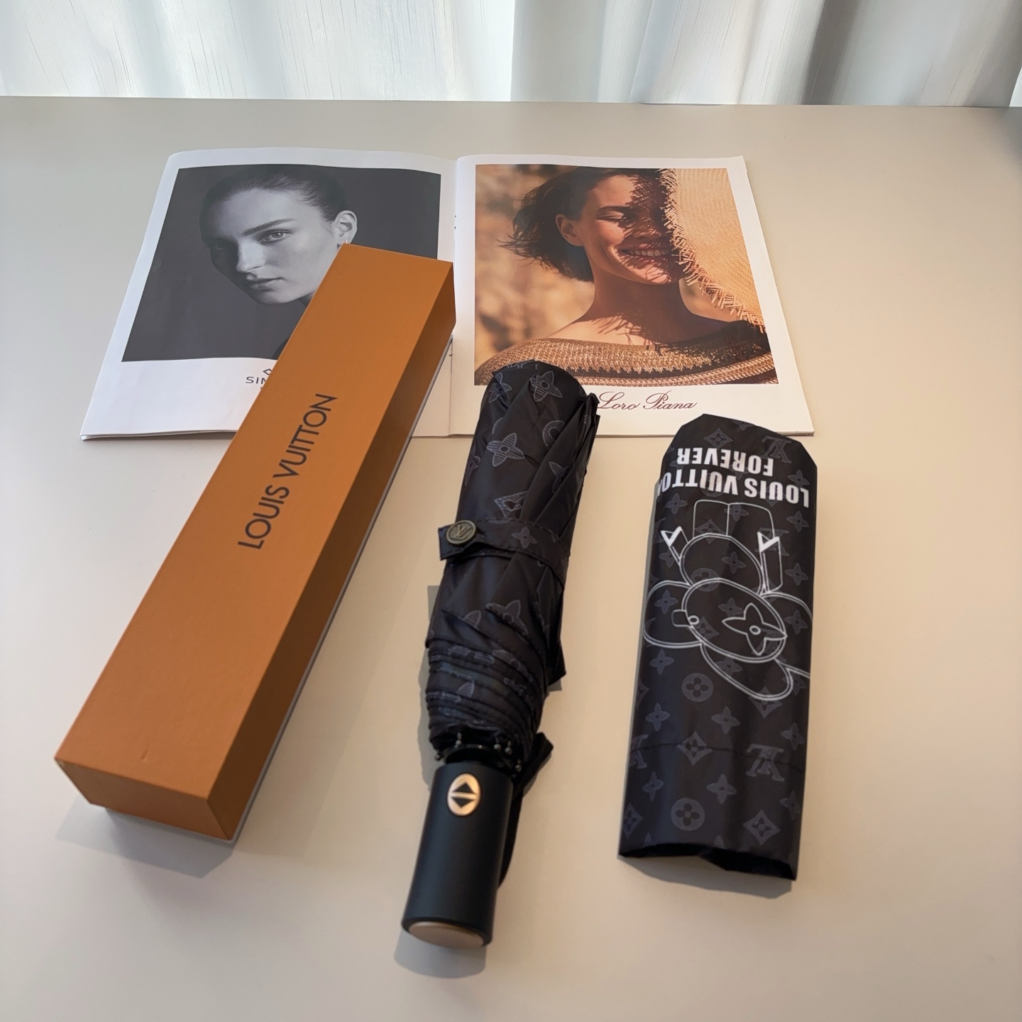 LOUIS VUITTON （路易威登）新款 三折自动折叠晴雨伞 新涂层技术深色伞面 拥有令人惊喜的遮光