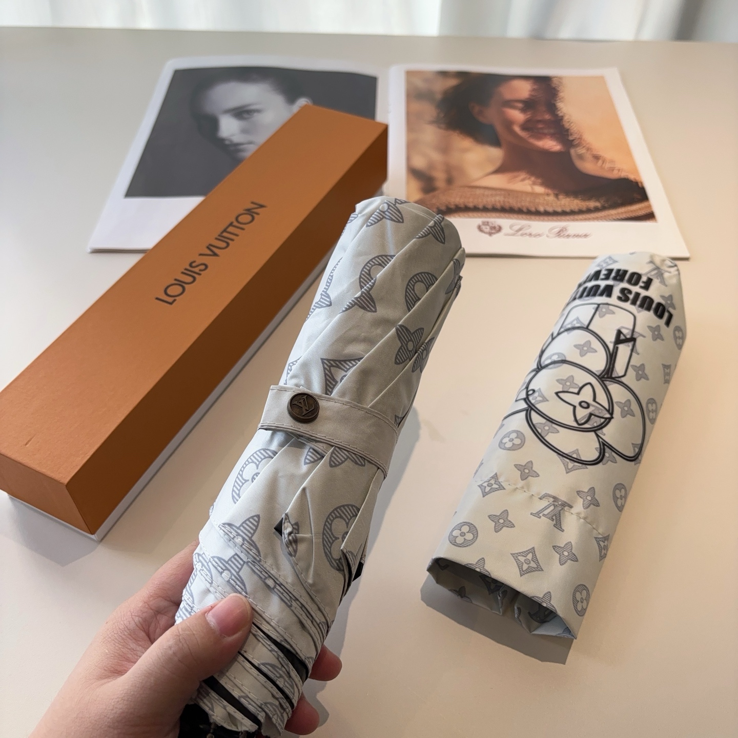 LOUIS VUITTON （路易威登）新款 三折自动折叠晴雨伞 新涂层技术深色伞面 拥有令人惊喜的遮光