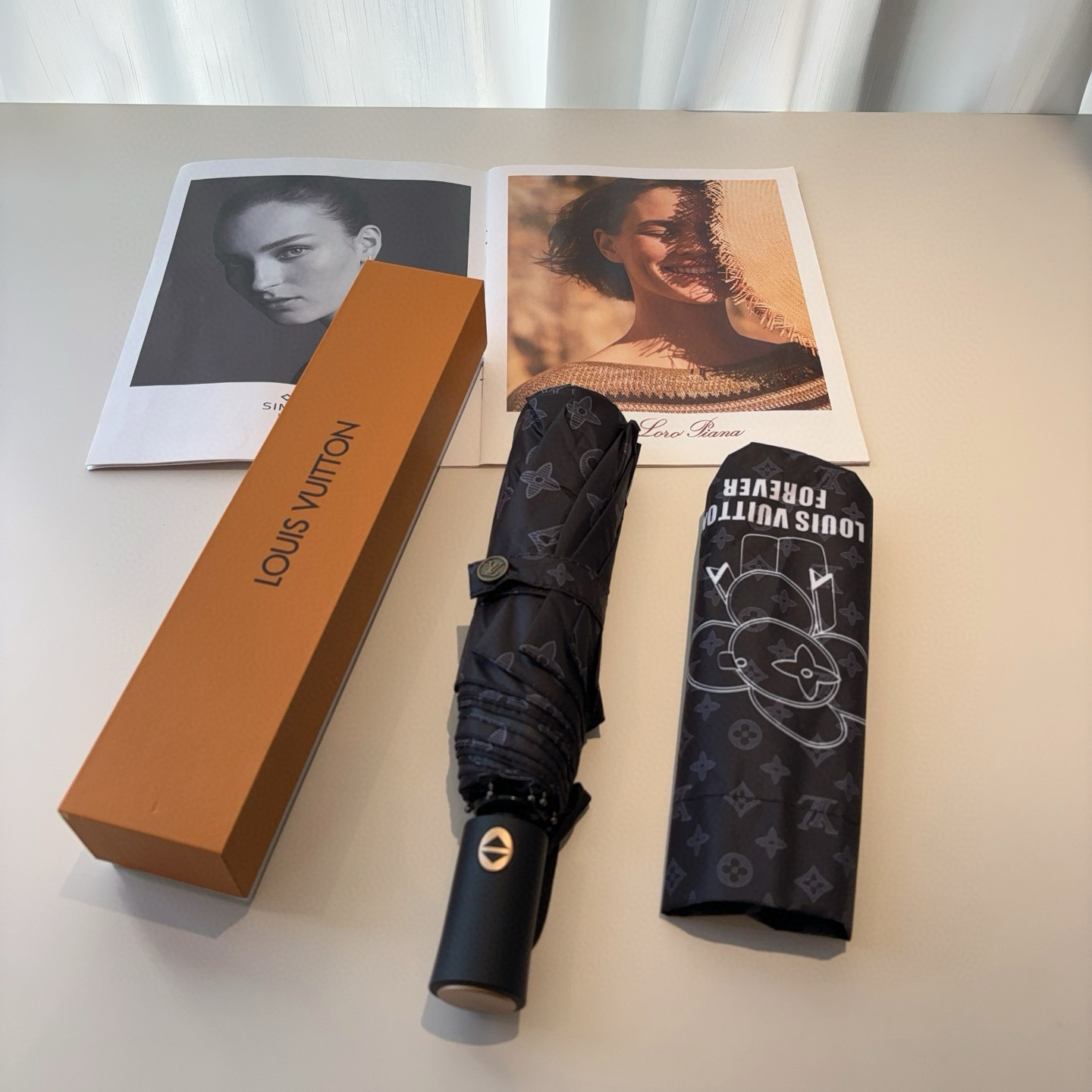 LOUIS VUITTON （路易威登）新款 三折自动折叠晴雨伞 新涂层技术深色伞面 拥有令人惊喜的遮光