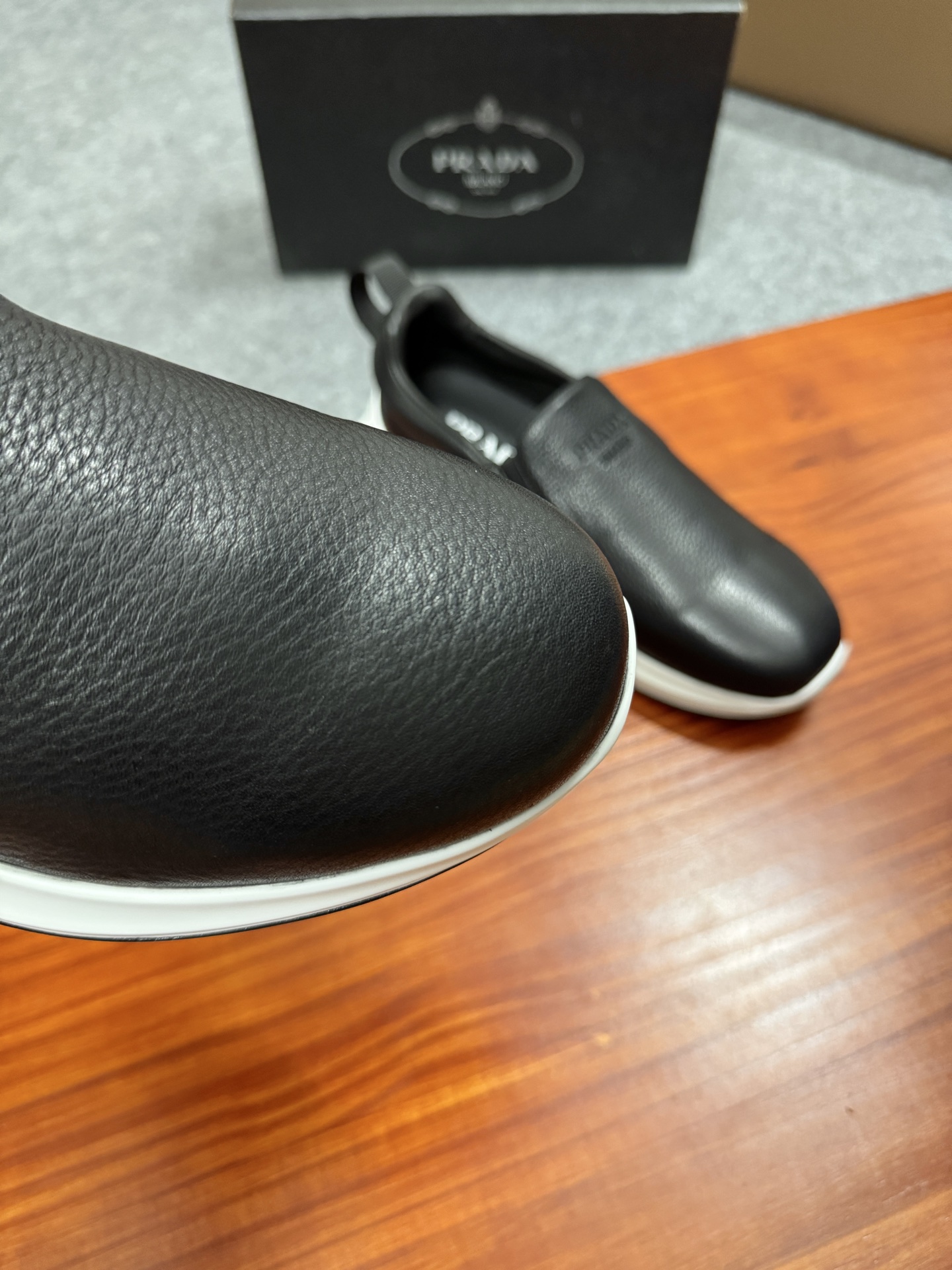 Prada Men's Black Leather Slip-On Sneakers With White Ultra-Light Sole 7 i1755596534628 6553 0 5