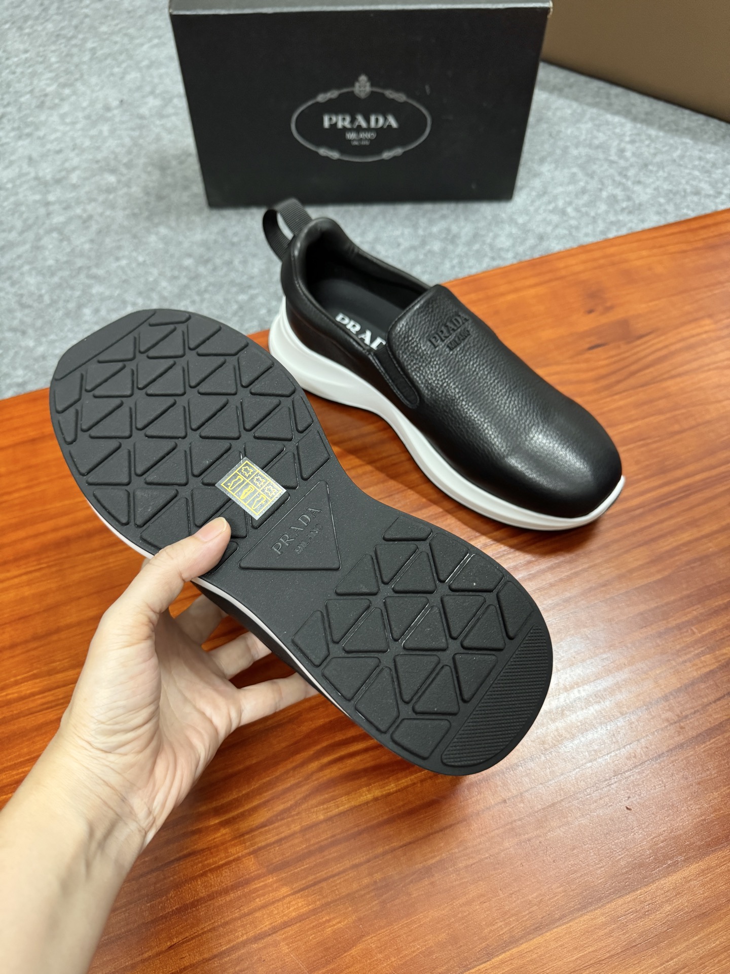 Prada Men's Black Leather Slip-On Sneakers With White Ultra-Light Sole 6 i1755596534993 8767 0 4