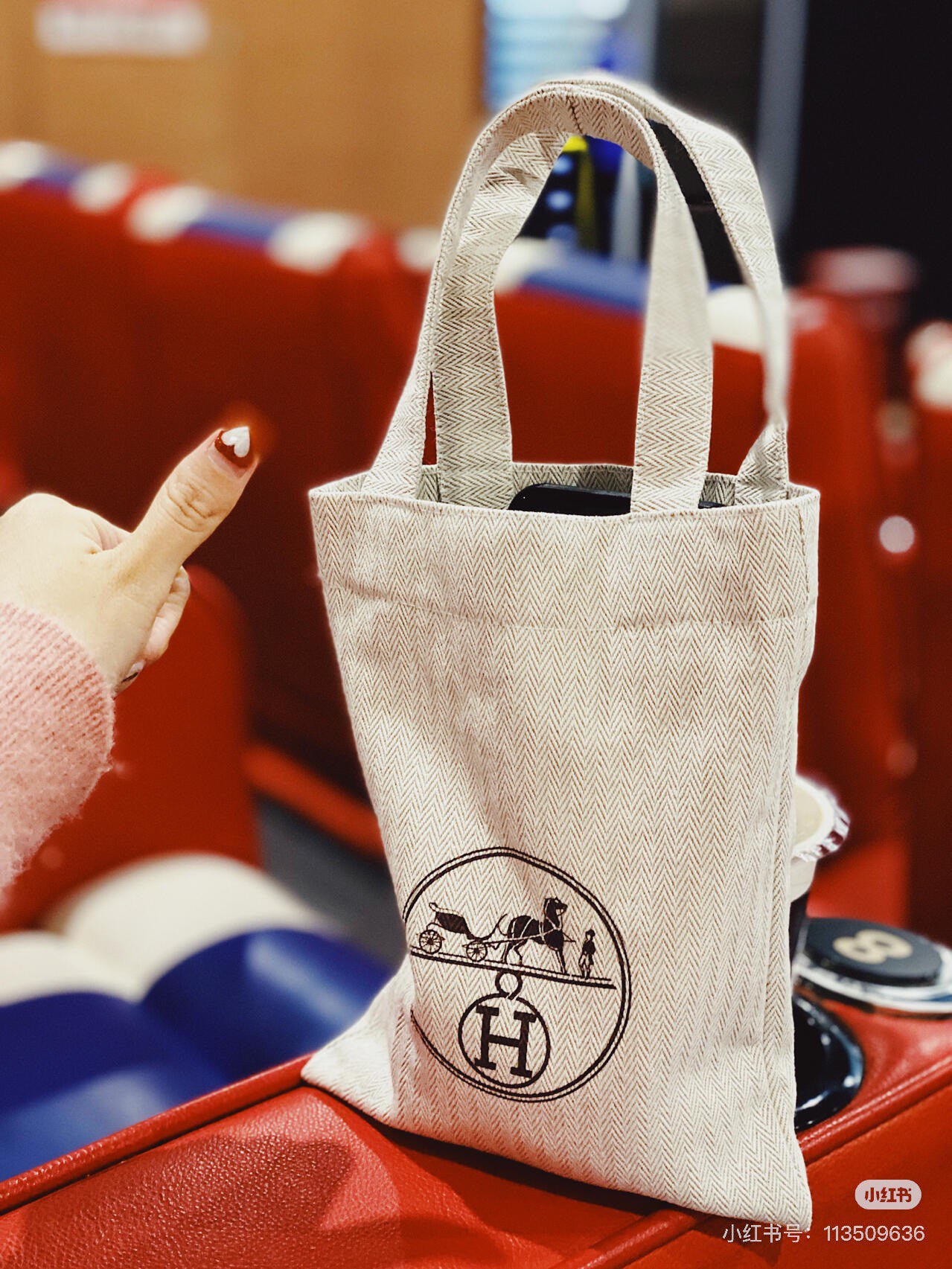 An understated canvas tote characterized by a minimalist silhouette and - Bag 5
