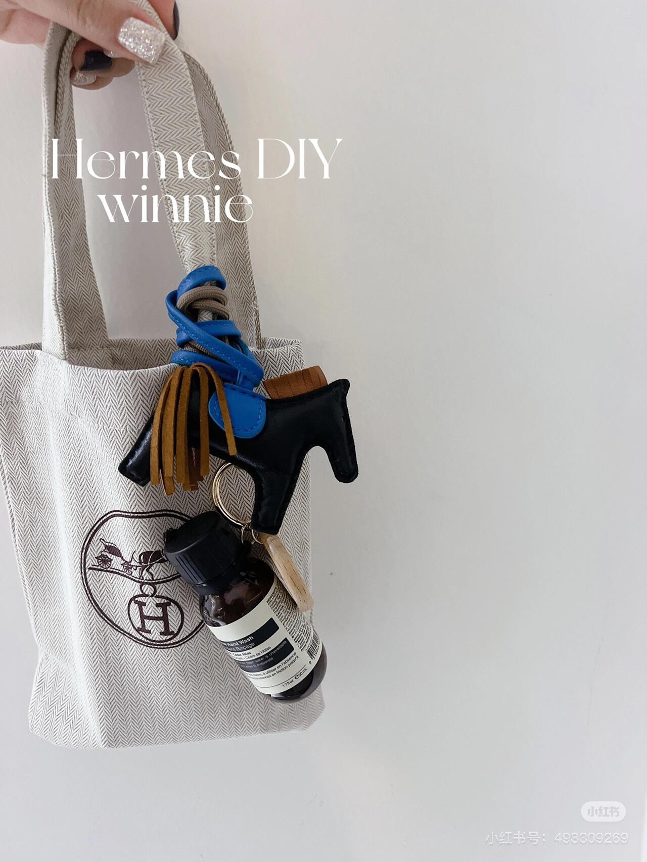 An understated canvas tote characterized by a minimalist silhouette and - Bag 8