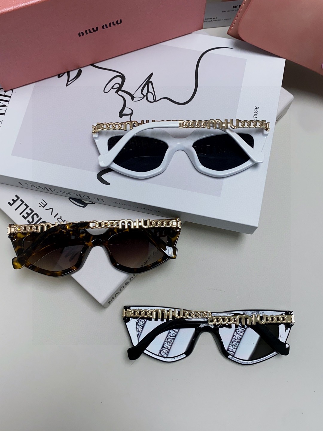   miumiu缪缪2025新款个性锥形太阳镜，高端奢侈 女士潮流眼镜 