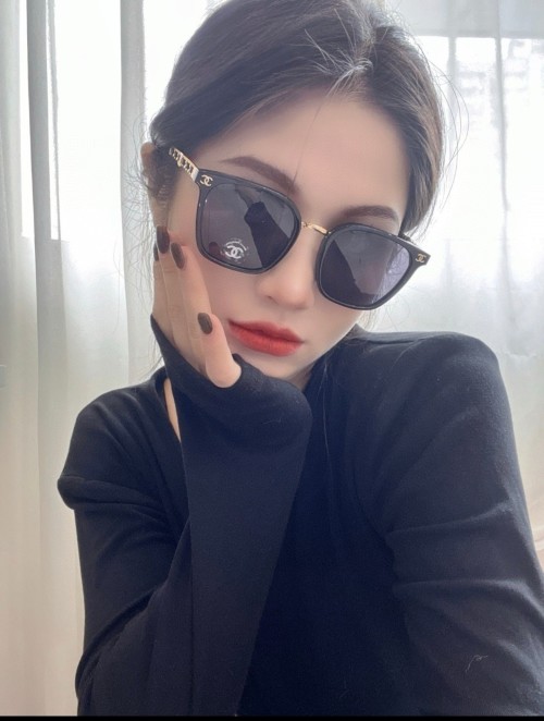 Elegant Chanel Sunglasses with Lambskin Accents and Signature Logo, Black 1 Elegant Chanel Sunglasses with Lambskin Accents and Signature Logo, Black
