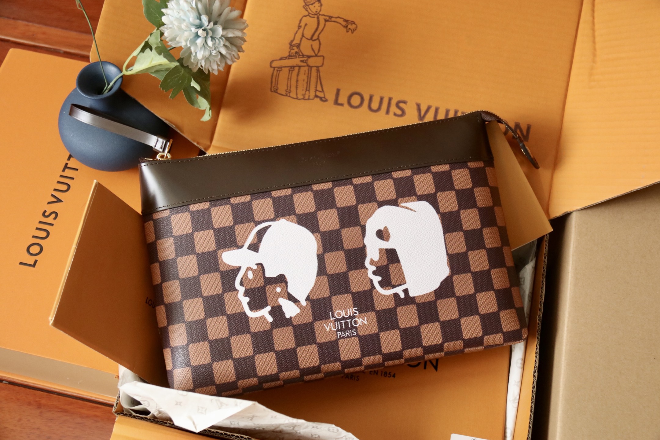 Louis Vuitton Pochette Voyage Souple Monogram Eclipse Coated Canvas Clutch 2 i1753339431423 2610 0 0