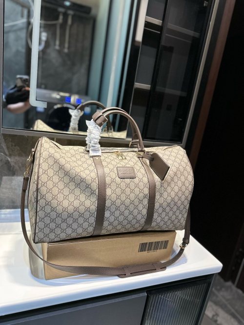 Gucci Duffle Bag, Stylish Travel Companion, Unisex Classic Design 1 Gucci Duffle Bag, Stylish Travel Companion, Unisex Classic Design