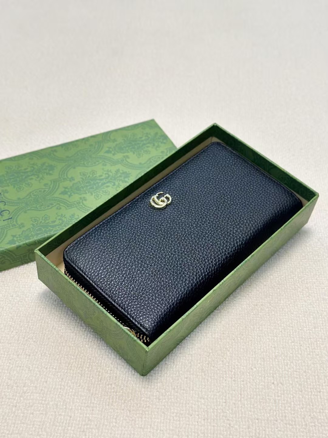 GUCCI ブラック牛皮単拉链手包 - 高級感あふれる手触りと優れた収納力