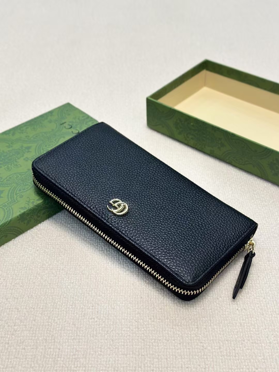 GUCCI ブラック牛皮単拉链手包 - 高級感あふれる手触りと優れた収納力