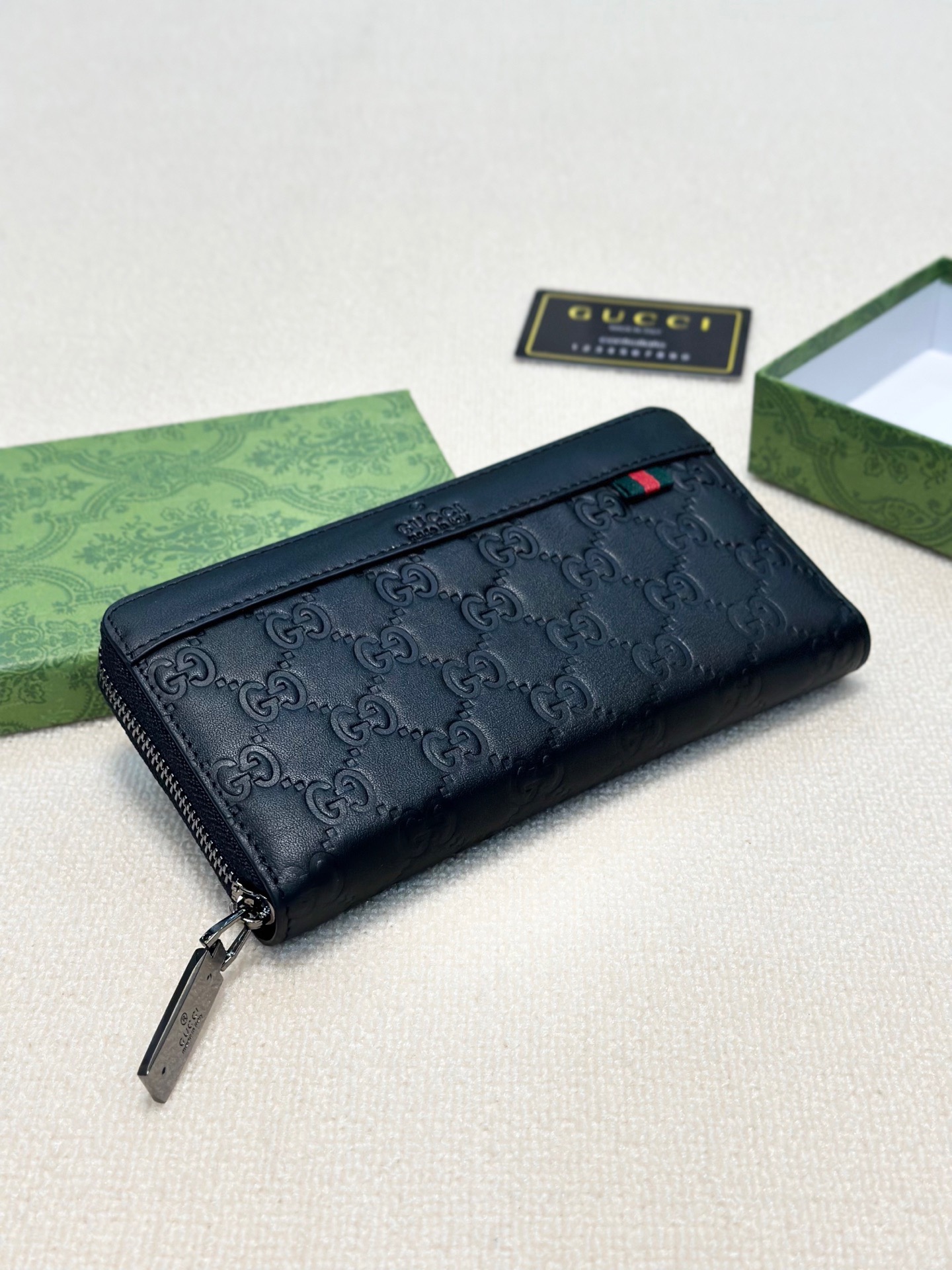 Gucci Men's Black Leather Zip Around Wallet With GG Embossed Pattern 5 i1746630235325 8538 0 3