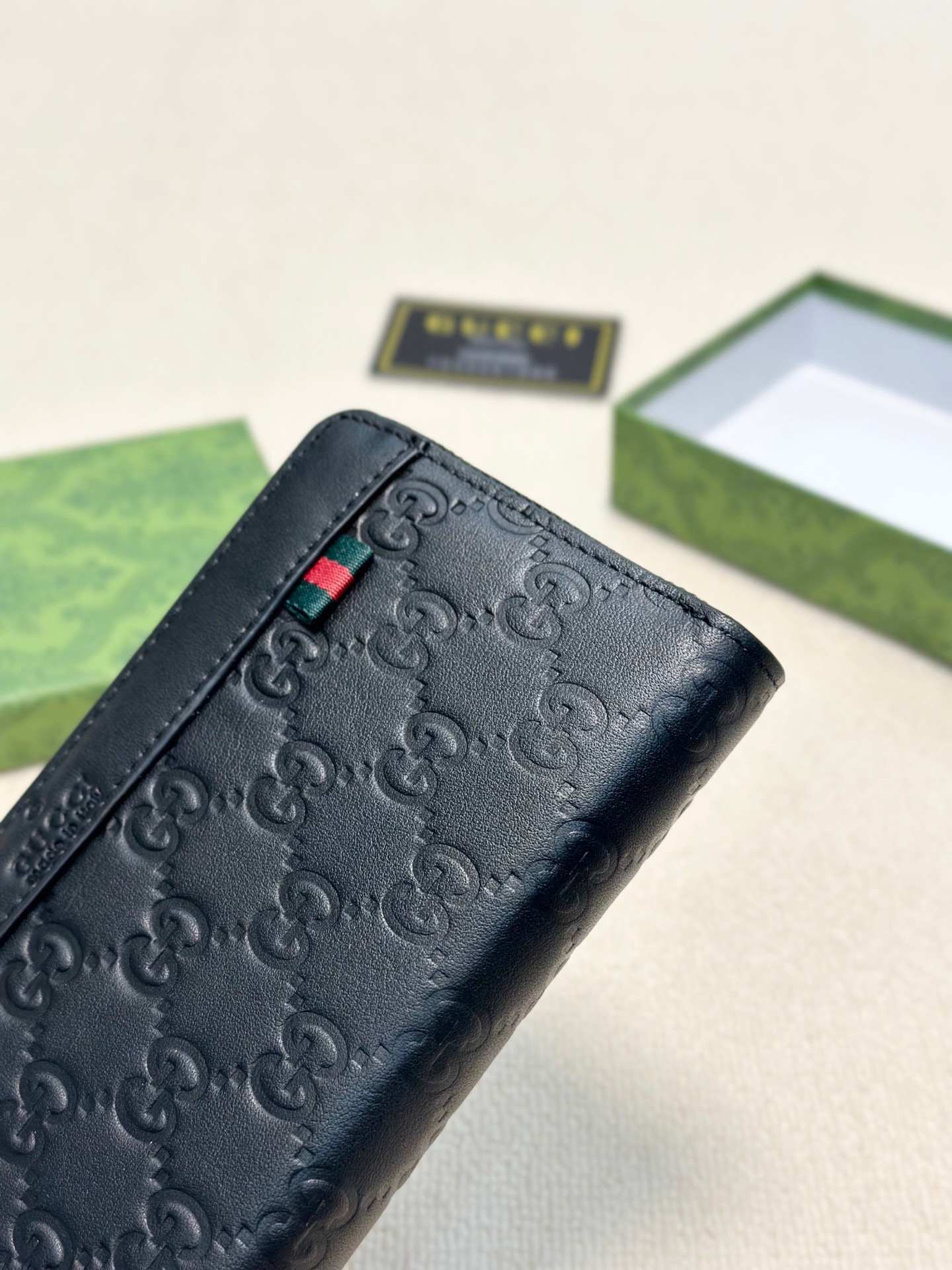 Gucci Men's Black Leather Zip Around Wallet With GG Embossed Pattern 6 i1746630235326 4656 0 4