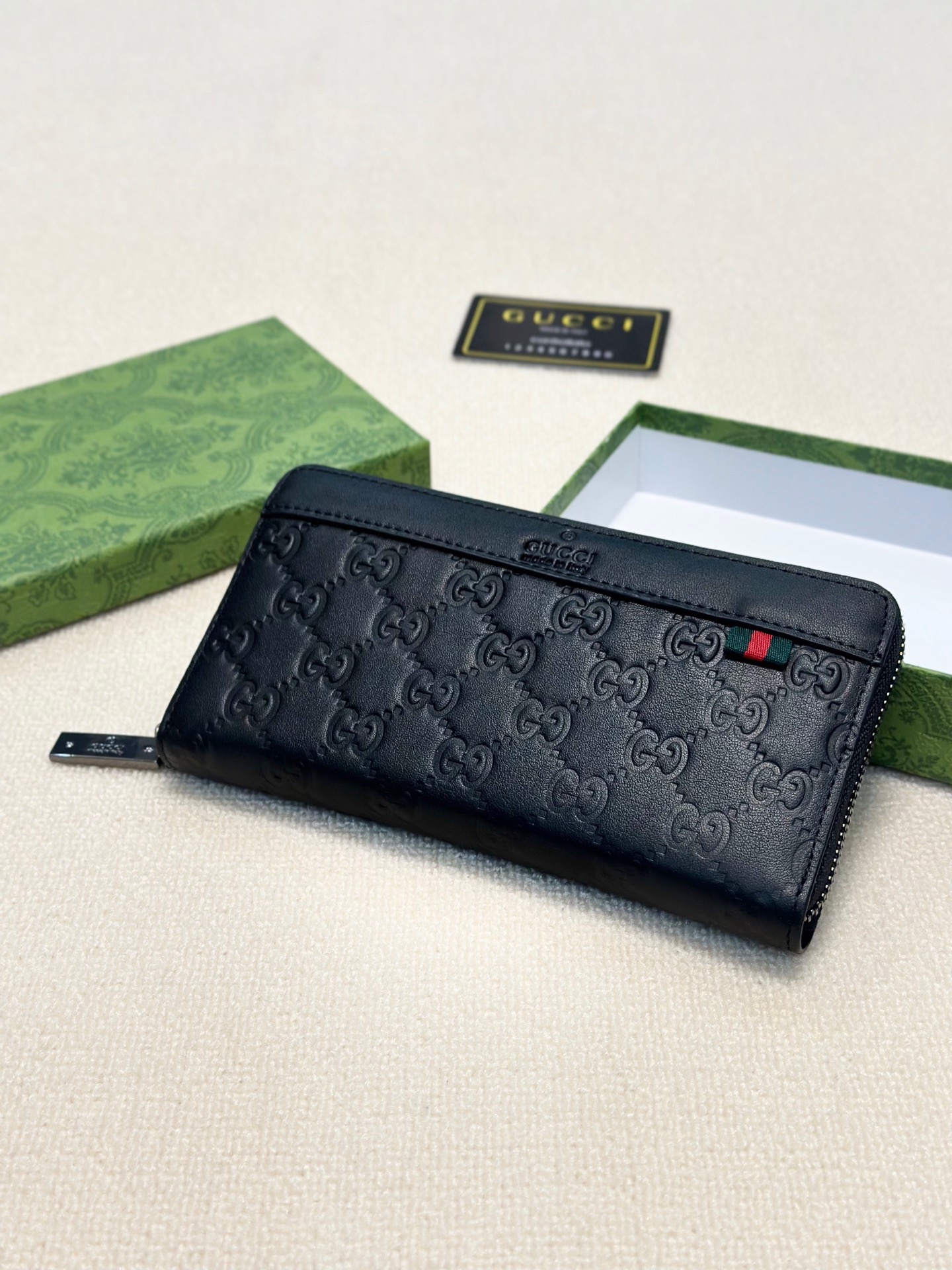 Gucci Men's Black Leather Zip Around Wallet With GG Embossed Pattern 9 i1746630235326 7864 0 7