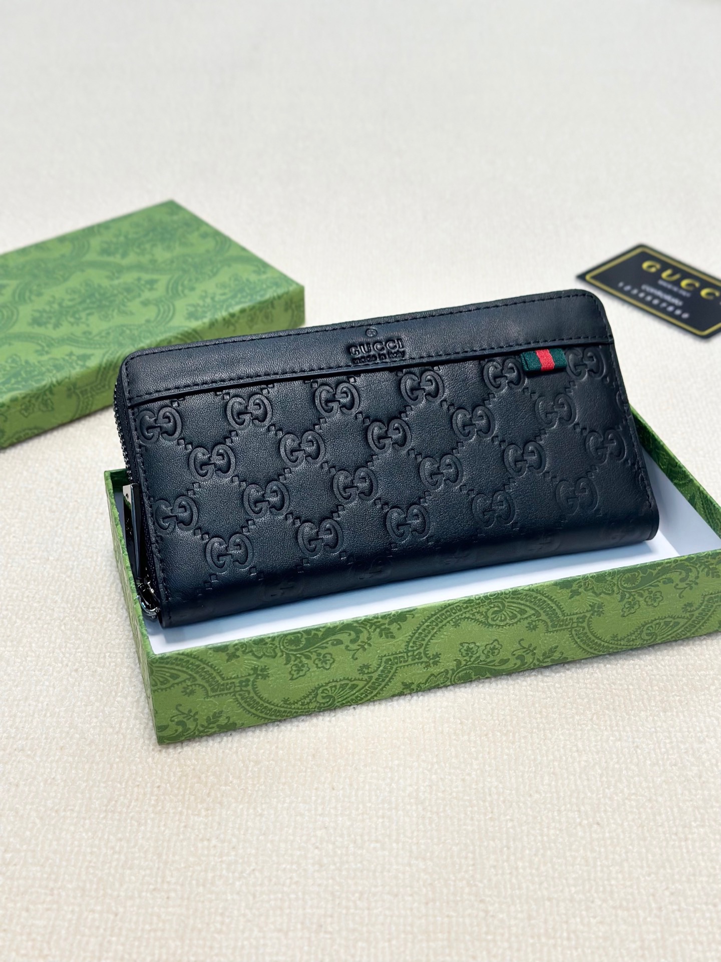 Gucci Men's Black Leather Zip Around Wallet With GG Embossed Pattern 2 i1746630239979 9437 0 0