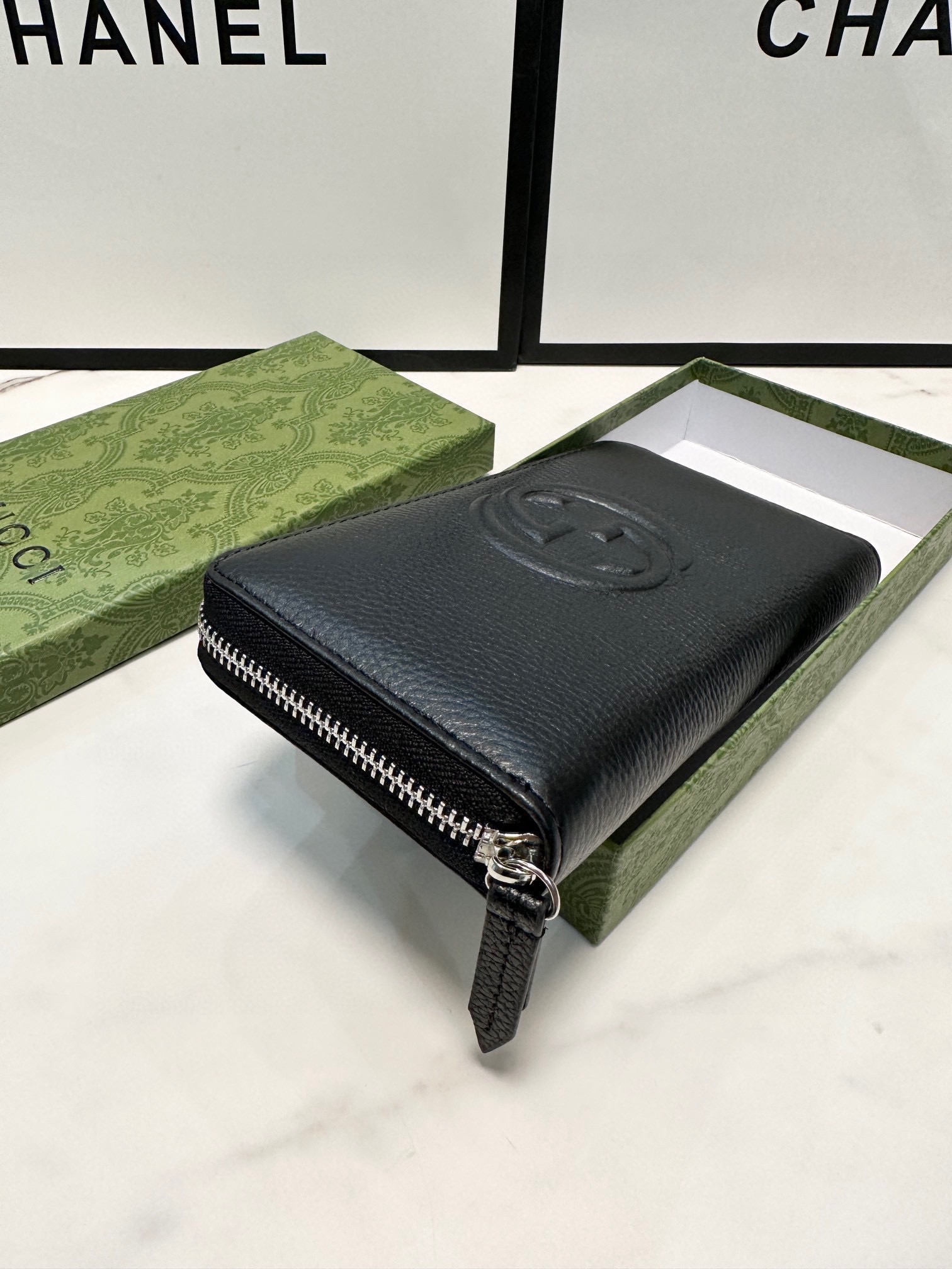 Gucci シングルファスナー手包 PVCと牛皮の高級感