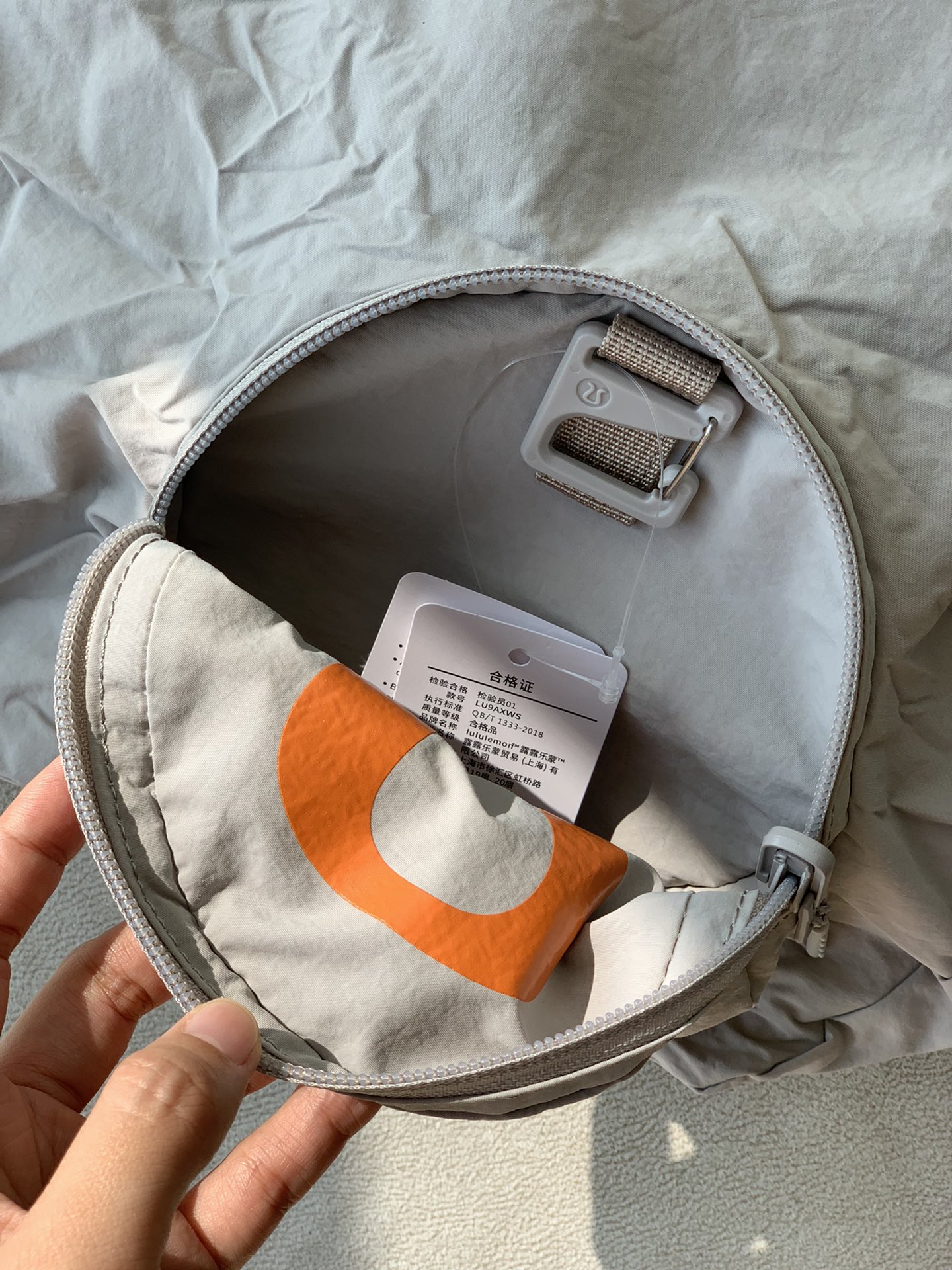 Packable tote bag with integrated clip-on charm functionality - Comprehensive 5