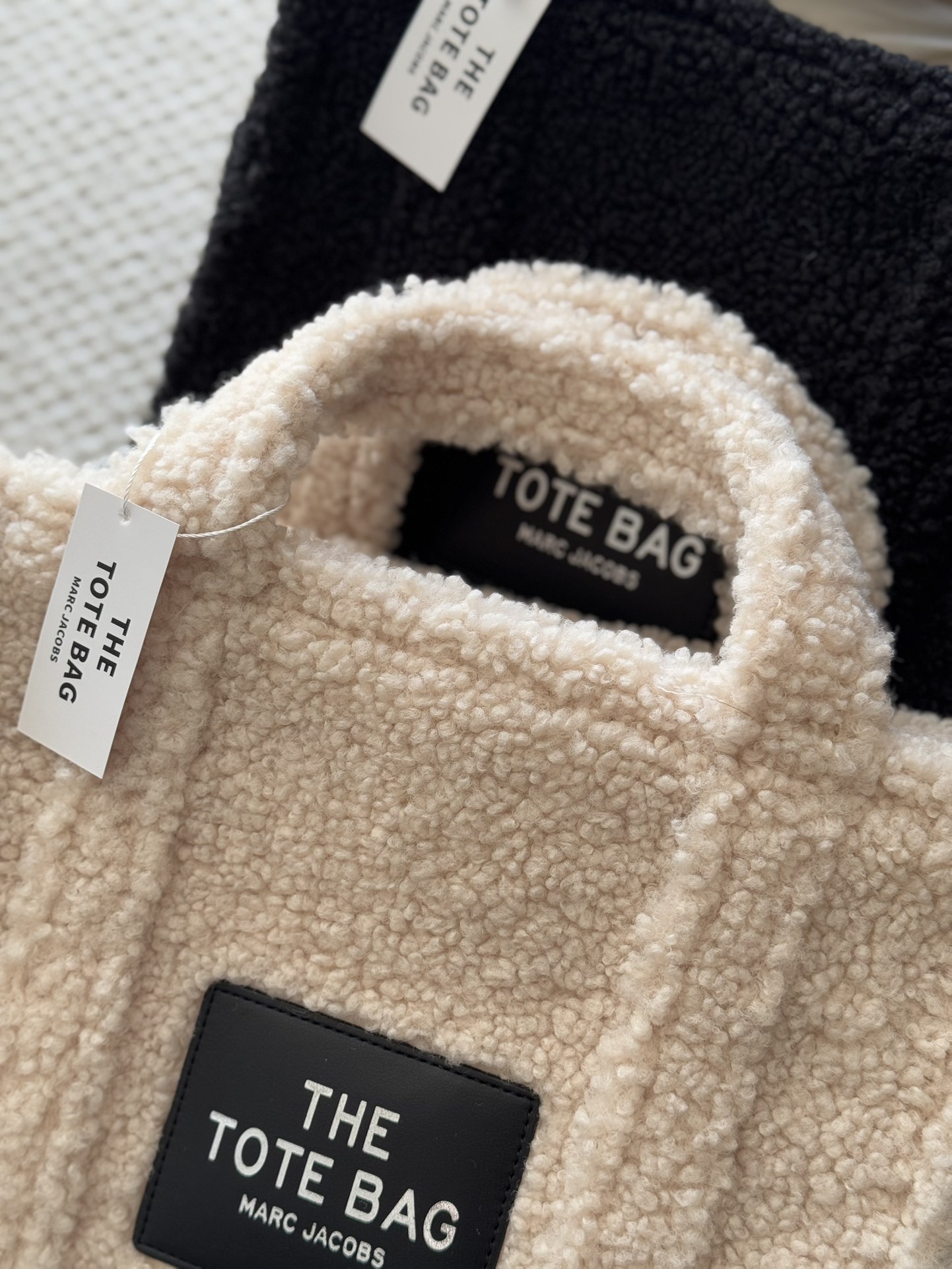 Crafted from soft, tactile shearling fleece. - Comprehensive 3