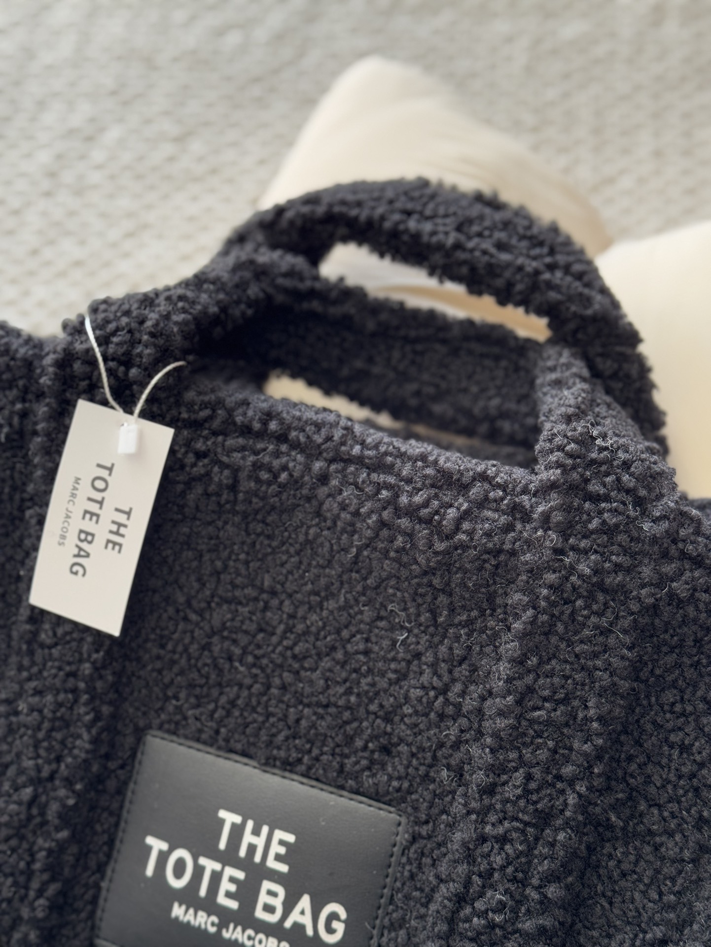 Crafted from soft, tactile shearling fleece. - Comprehensive 5