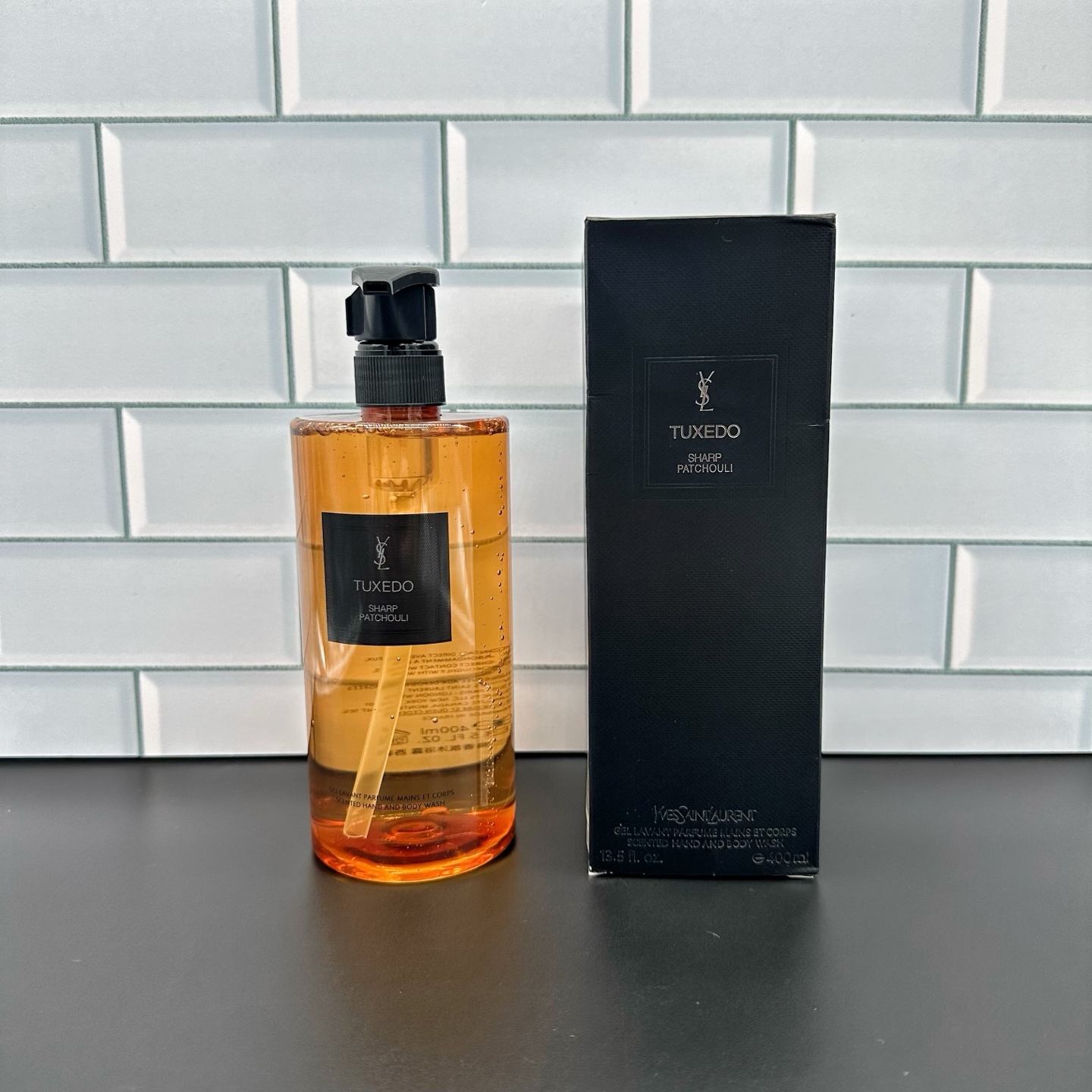 52. Gel de baño Yves Saint Laurent alta costura traje 400ml 52. Gel de baño Yves Saint Laurent alta costura camisa 400m…