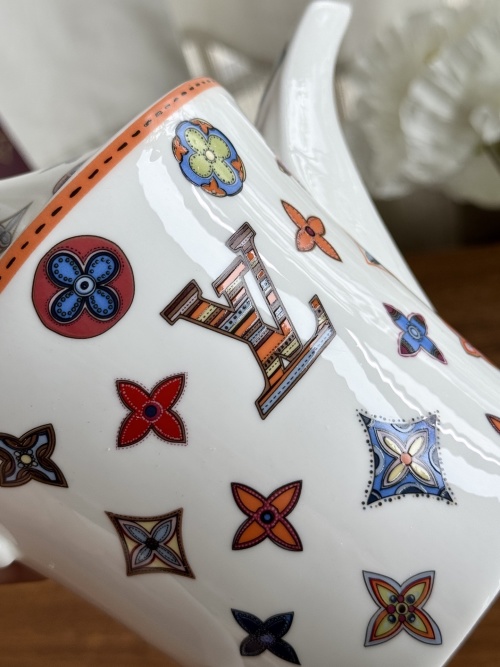 Louis Vuitton Handmade Ceramic Pitcher with Colorful Glaze and LV Patterns 1 Louis Vuitton Handmade Ceramic Pitcher with Colorful Glaze and LV Patterns