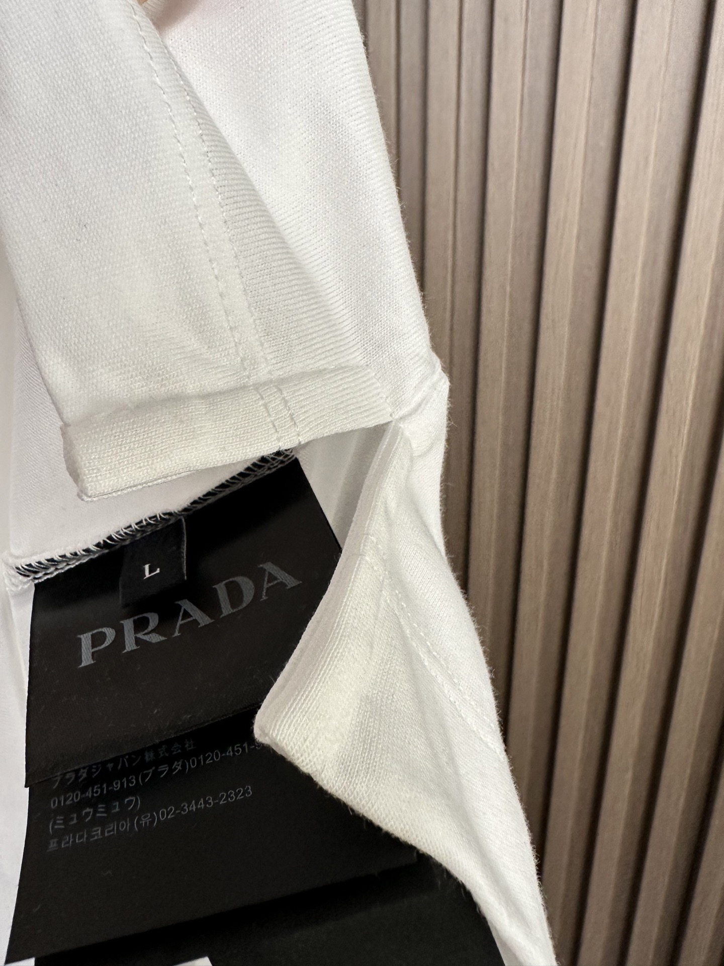 🔥（白～）Prada普拉达26SS春夏新款机能风短袖 | 极简与硬核的碰撞甄选高支双股棉料，垂坠挺括，透