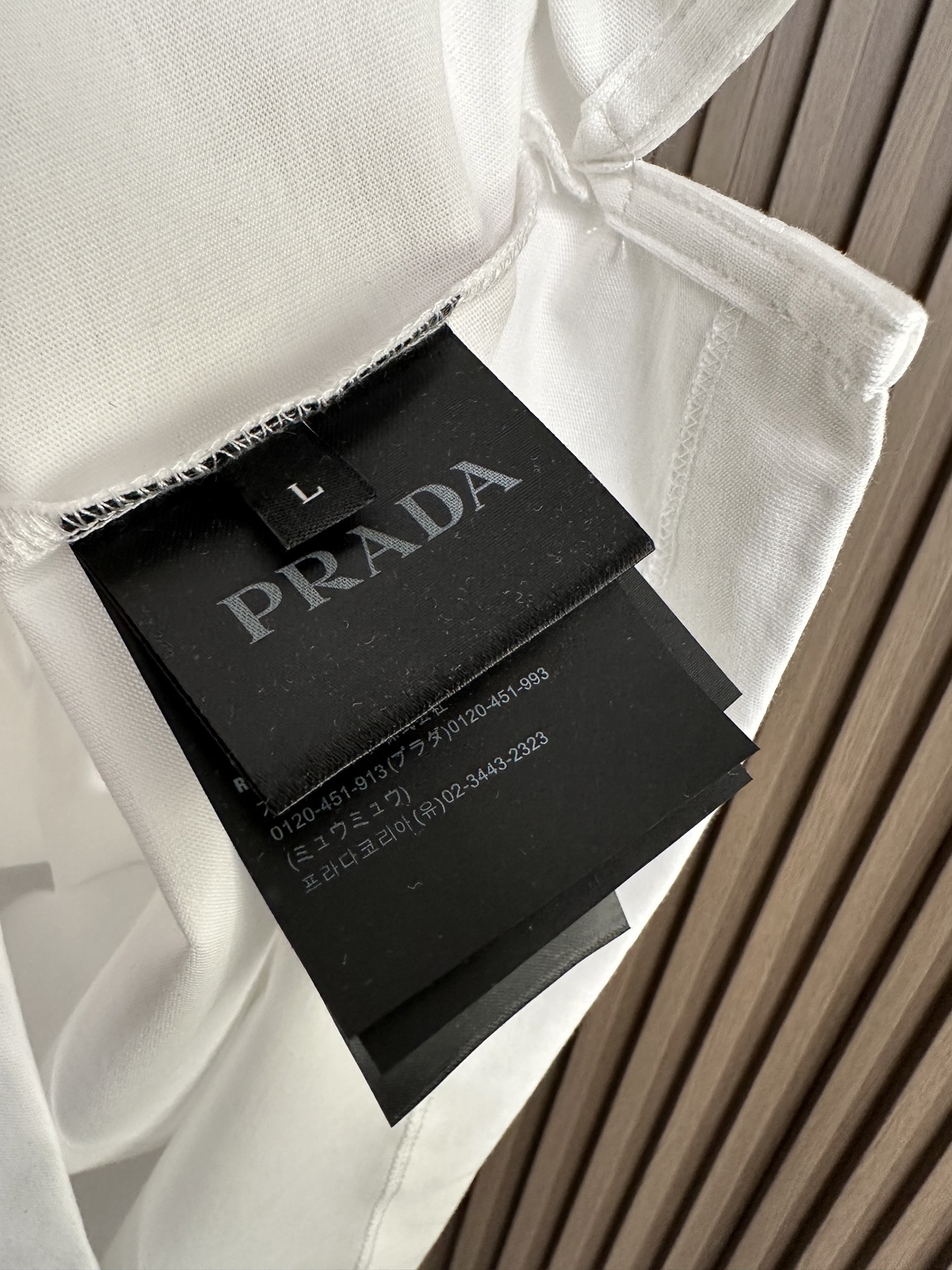 🔥（白～）Prada普拉达26SS春夏新款机能风短袖 | 极简与硬核的碰撞甄选高支双股棉料，垂坠挺括，透