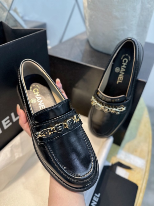 Elegant Chanel Black Leather Loafers with Chain Detail and Camellia Embellishment 1 Elegant Chanel Black Leather Loafers with Chain Detail and Camellia Embellishment