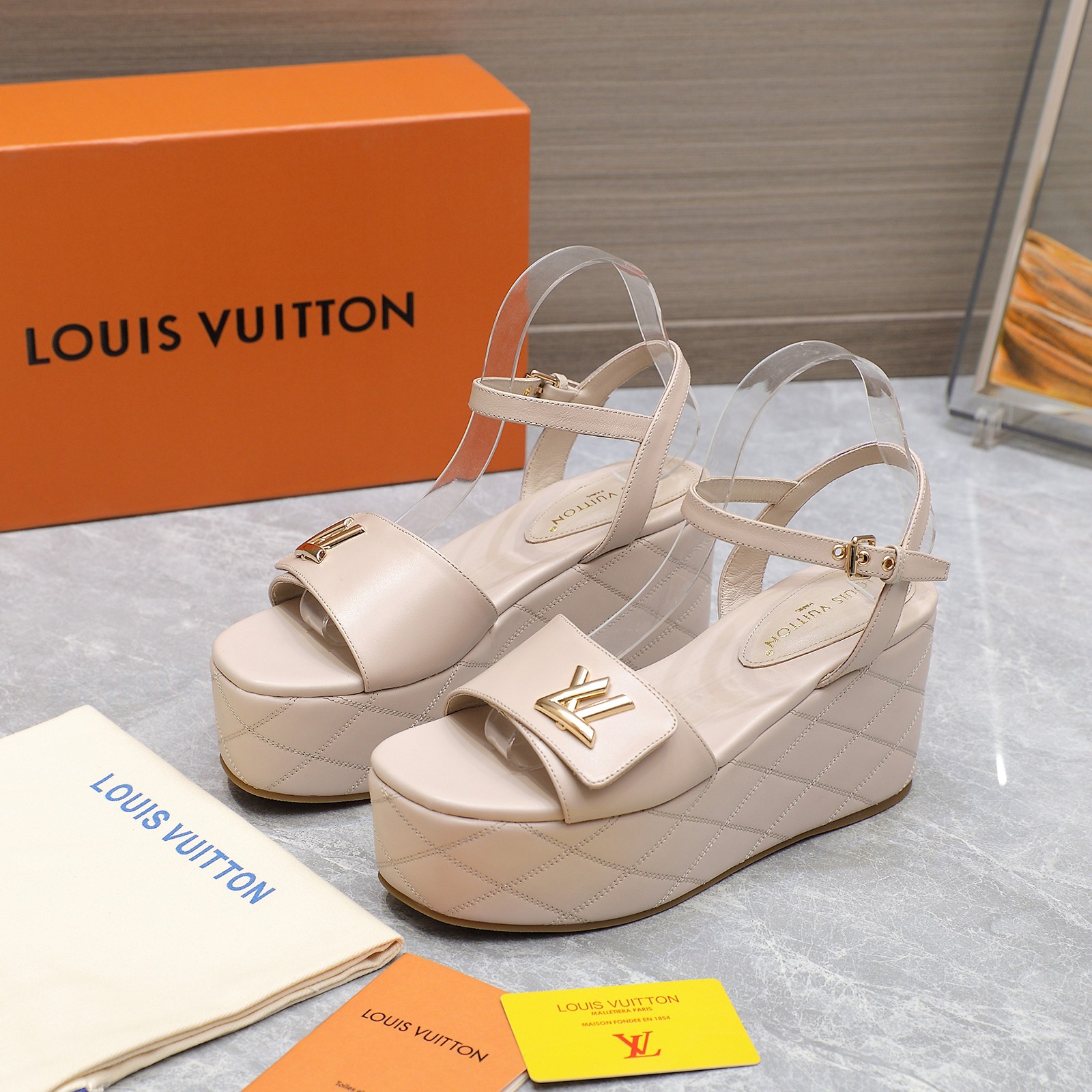 Louis Vuitton Women's Shake Wedge Sandals in Calfskin with LV Embellishment 3 a1734613994704 4200
