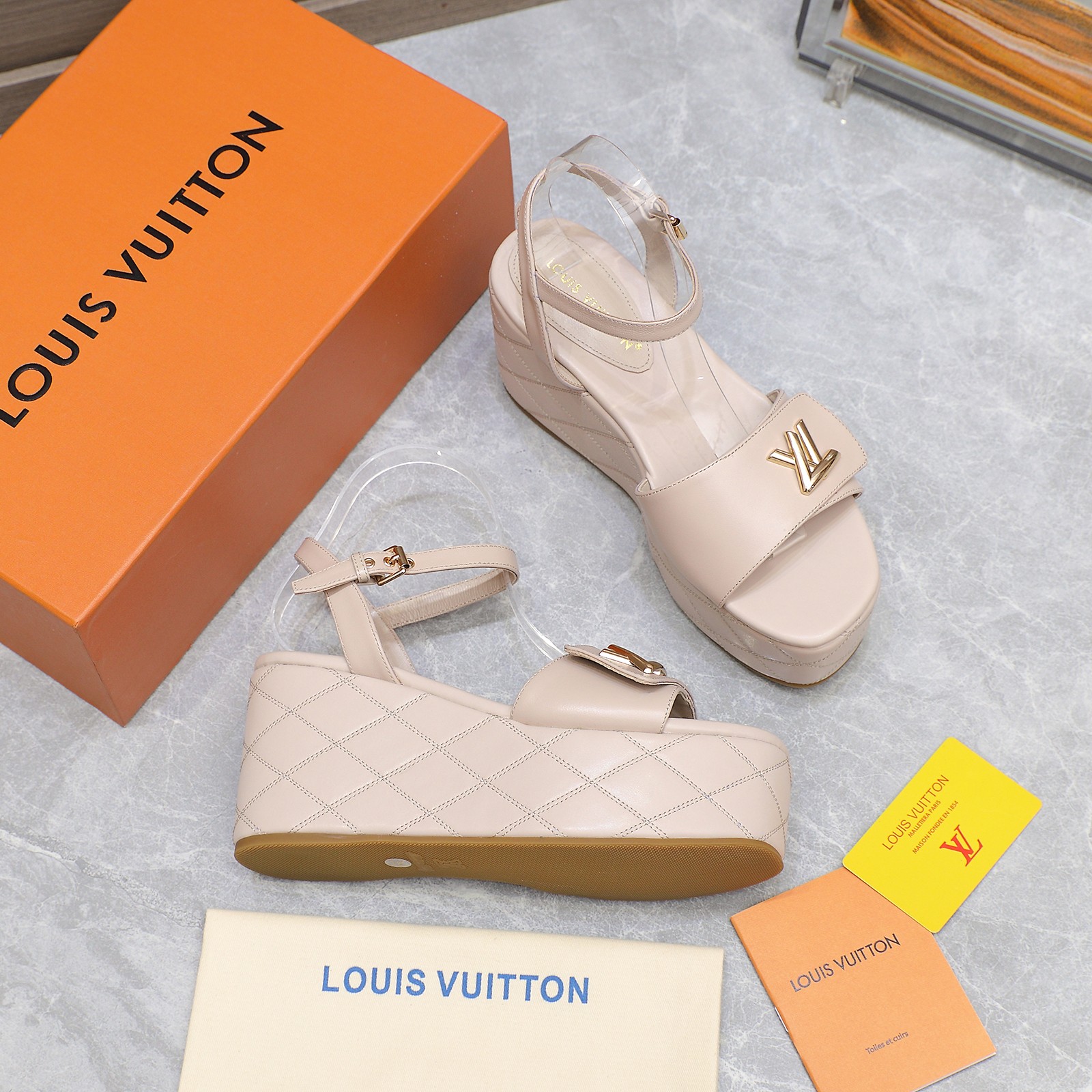 Louis Vuitton Women's Shake Wedge Sandals in Calfskin with LV Embellishment 8 a1734613996252 7685