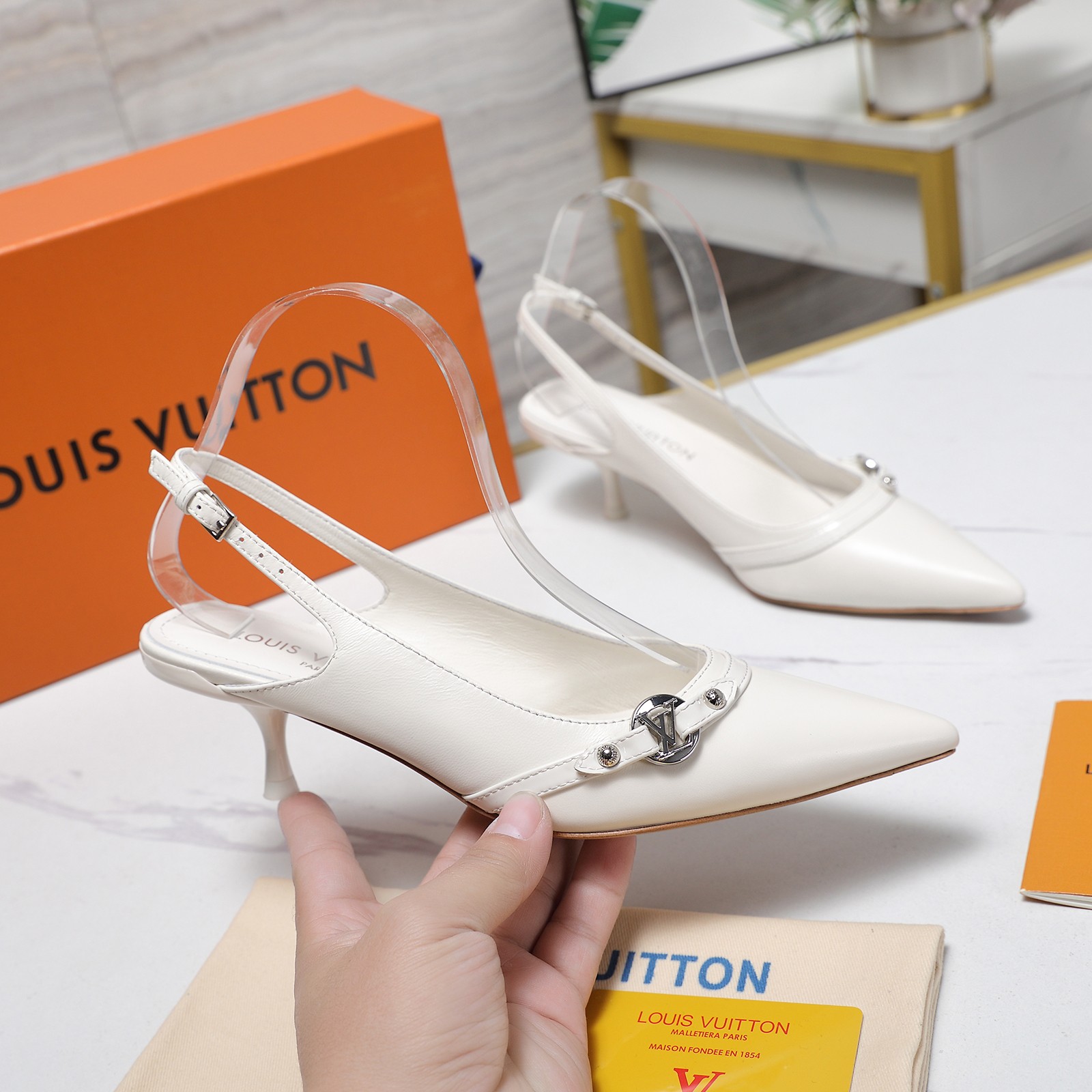 Louis Vuitton Urban Twist Slingback Pumps in White Leather with LV Circle 2 a1736413309344 8415