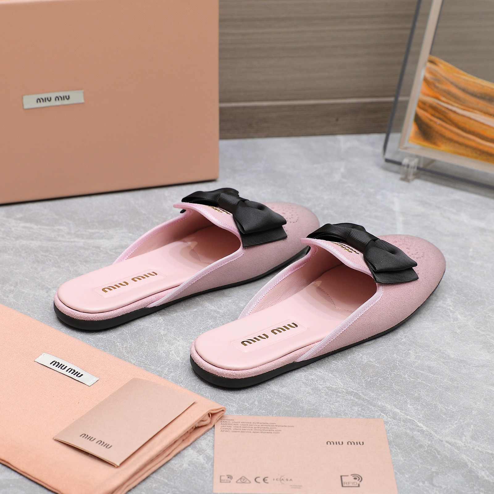 Miu Miu Bow-Embellished Leather Loafer Mules with Scalloped Perforations 8 a1736428776876 8688