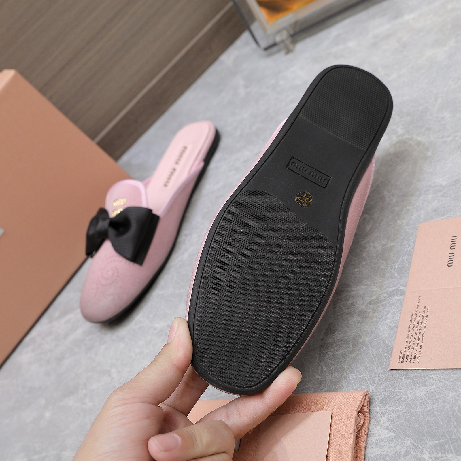 Miu Miu Bow-Embellished Leather Loafer Mules with Scalloped Perforations 7 a1736428776888 1111