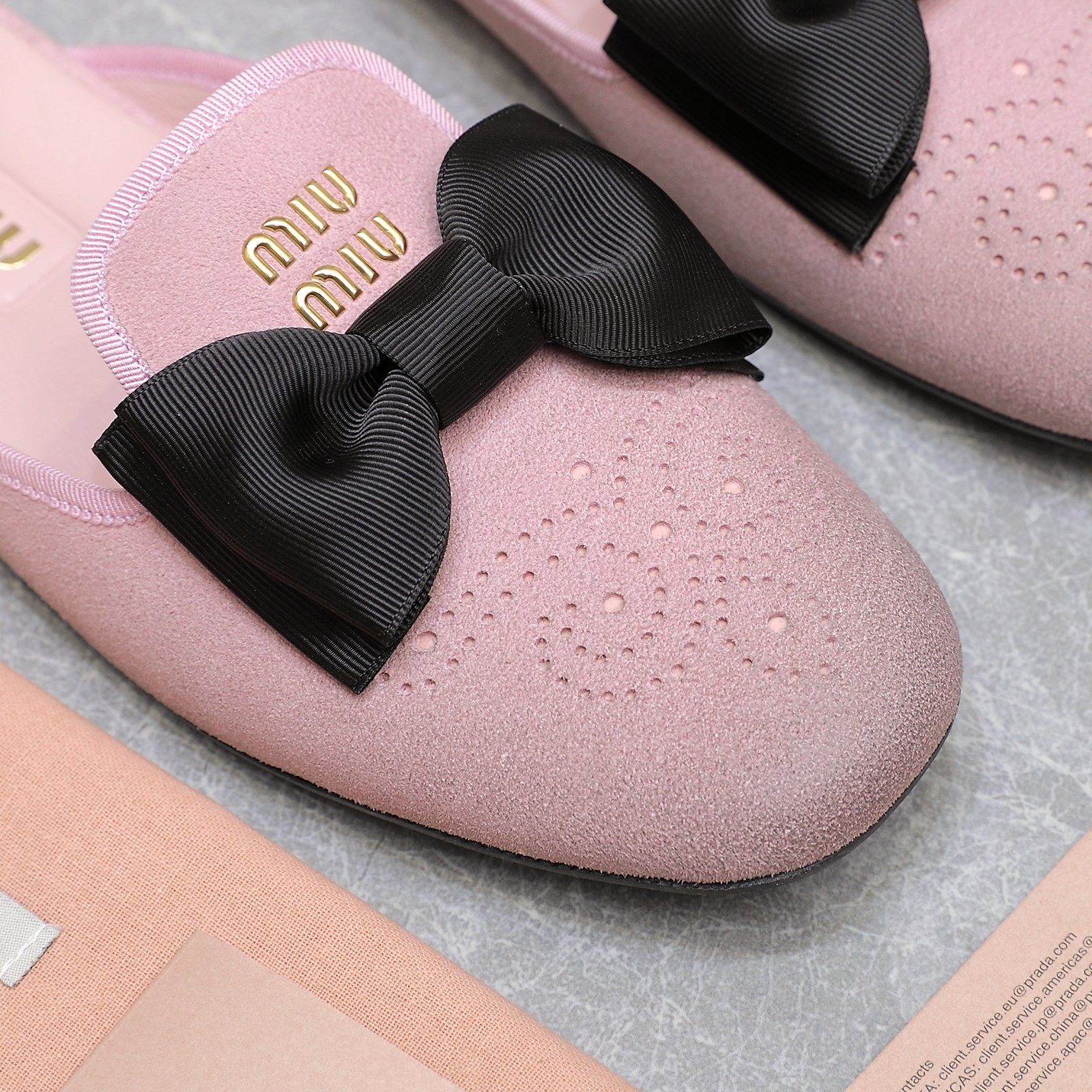 Miu Miu Bow-Embellished Leather Loafer Mules with Scalloped Perforations 9 a1736428778818 7722