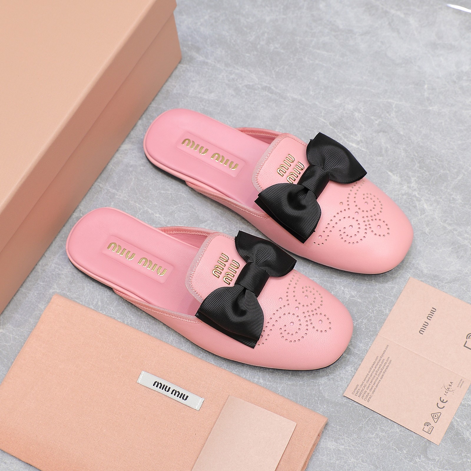 Miu Miu Bow-Embellished Perforated Leather Loafer Mules, Spring/Summer Collection