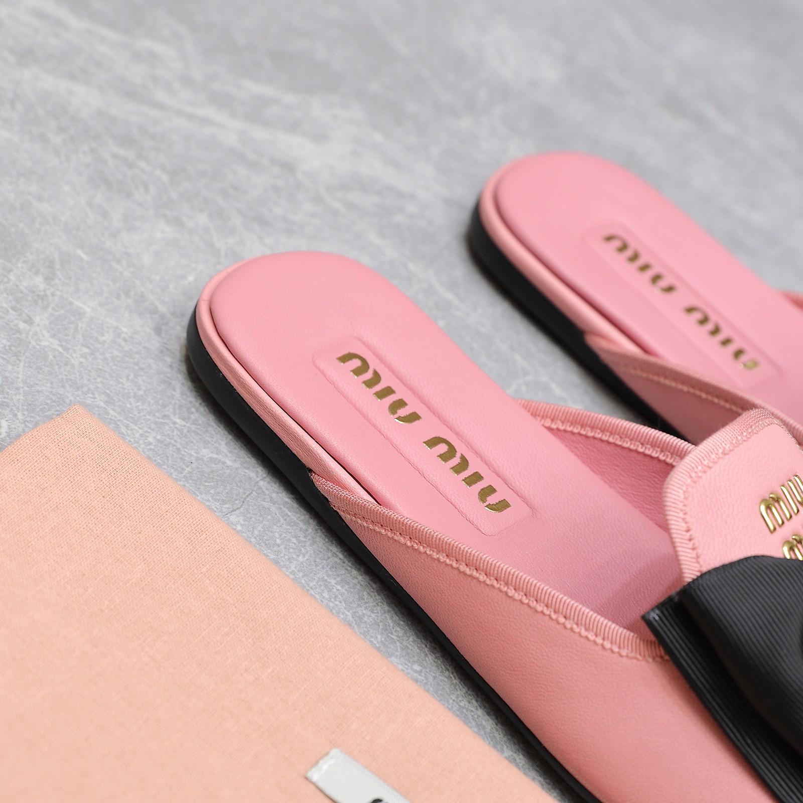 Miu Miu Bow-Embellished Perforated Leather Loafer Mules, Spring/Summer Collection 6 a1736428802463 6531