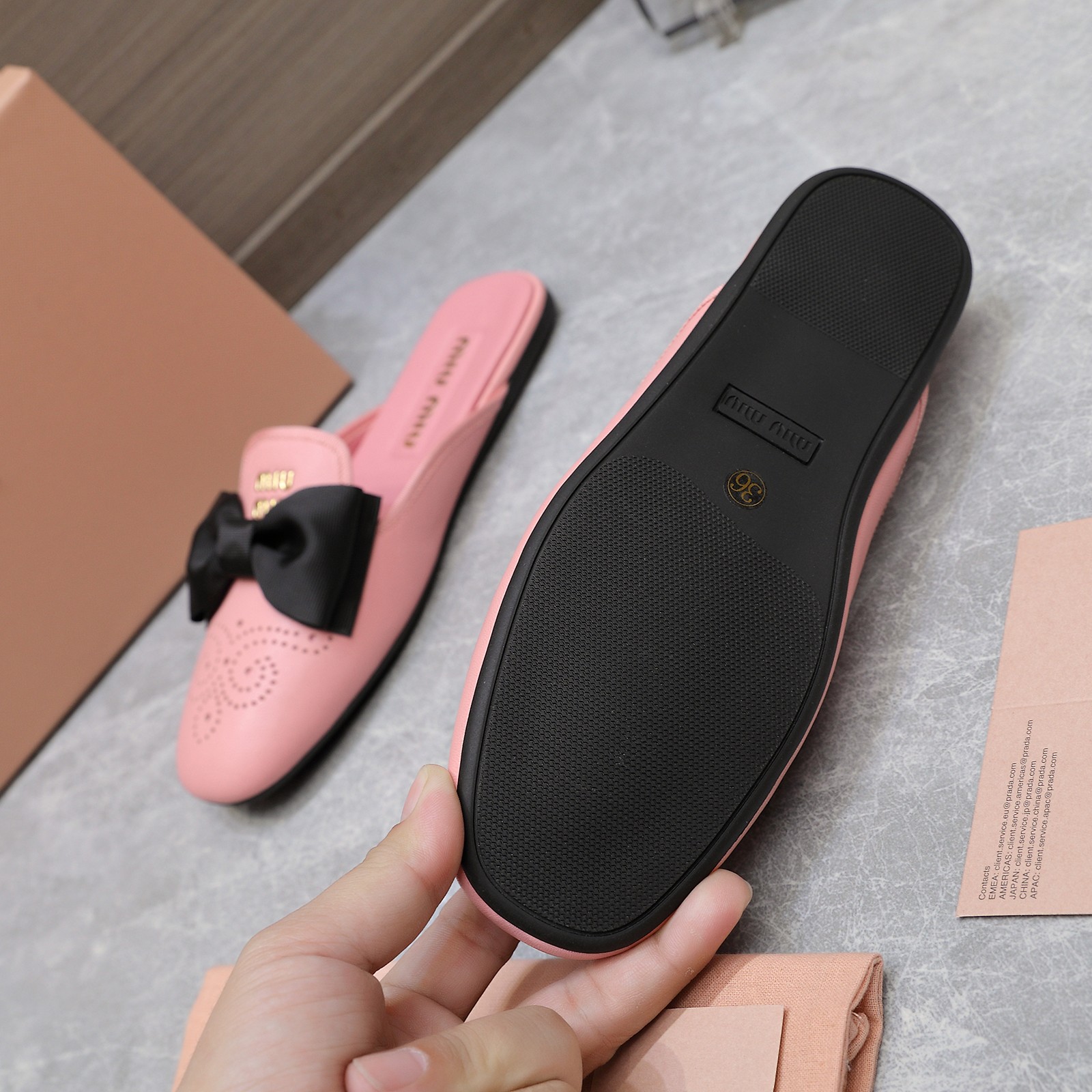 Miu Miu Bow-Embellished Perforated Leather Loafer Mules, Spring/Summer Collection 10 a1736428804487 1182