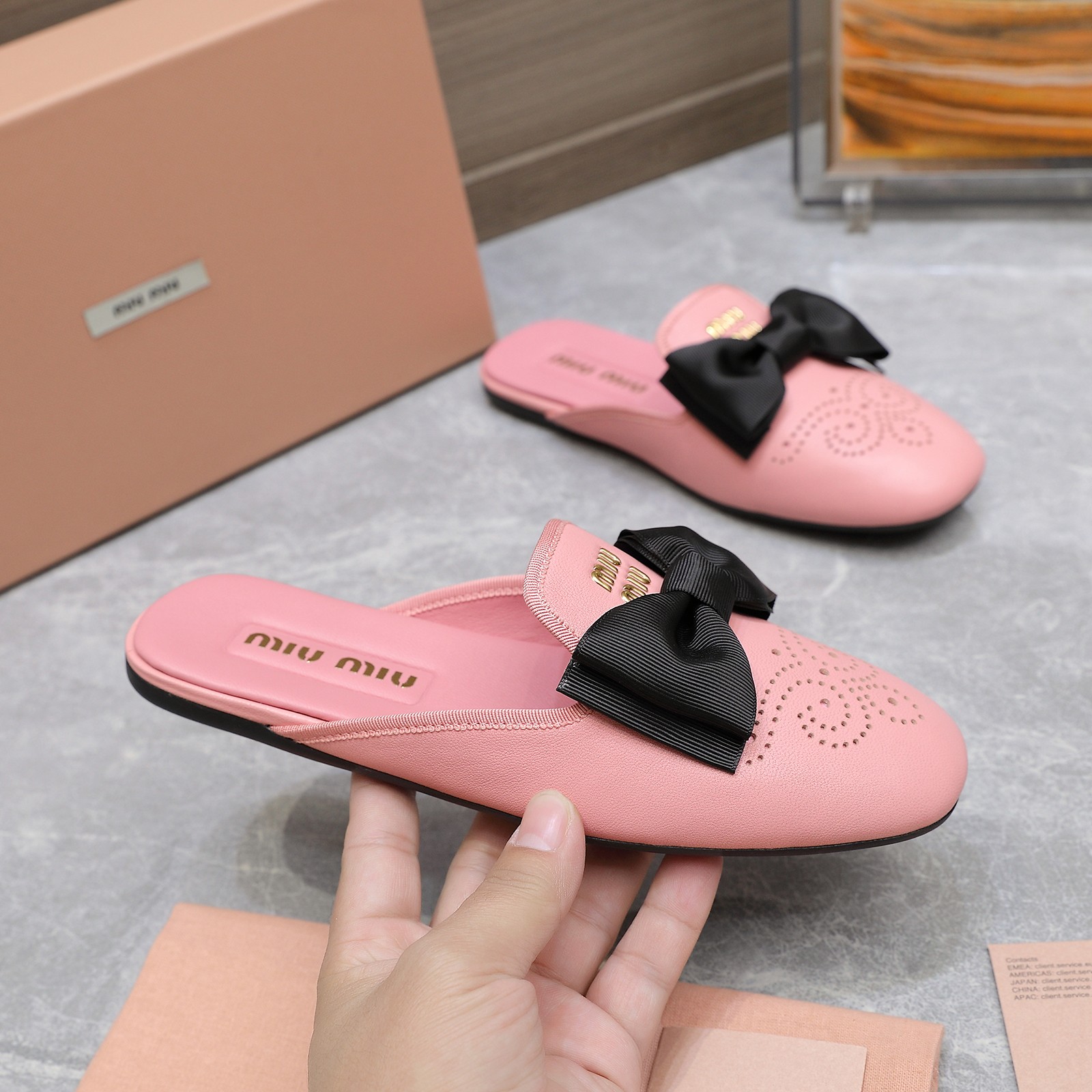 Miu Miu Bow-Embellished Perforated Leather Loafer Mules, Spring/Summer Collection 3 a1736428804521 4585