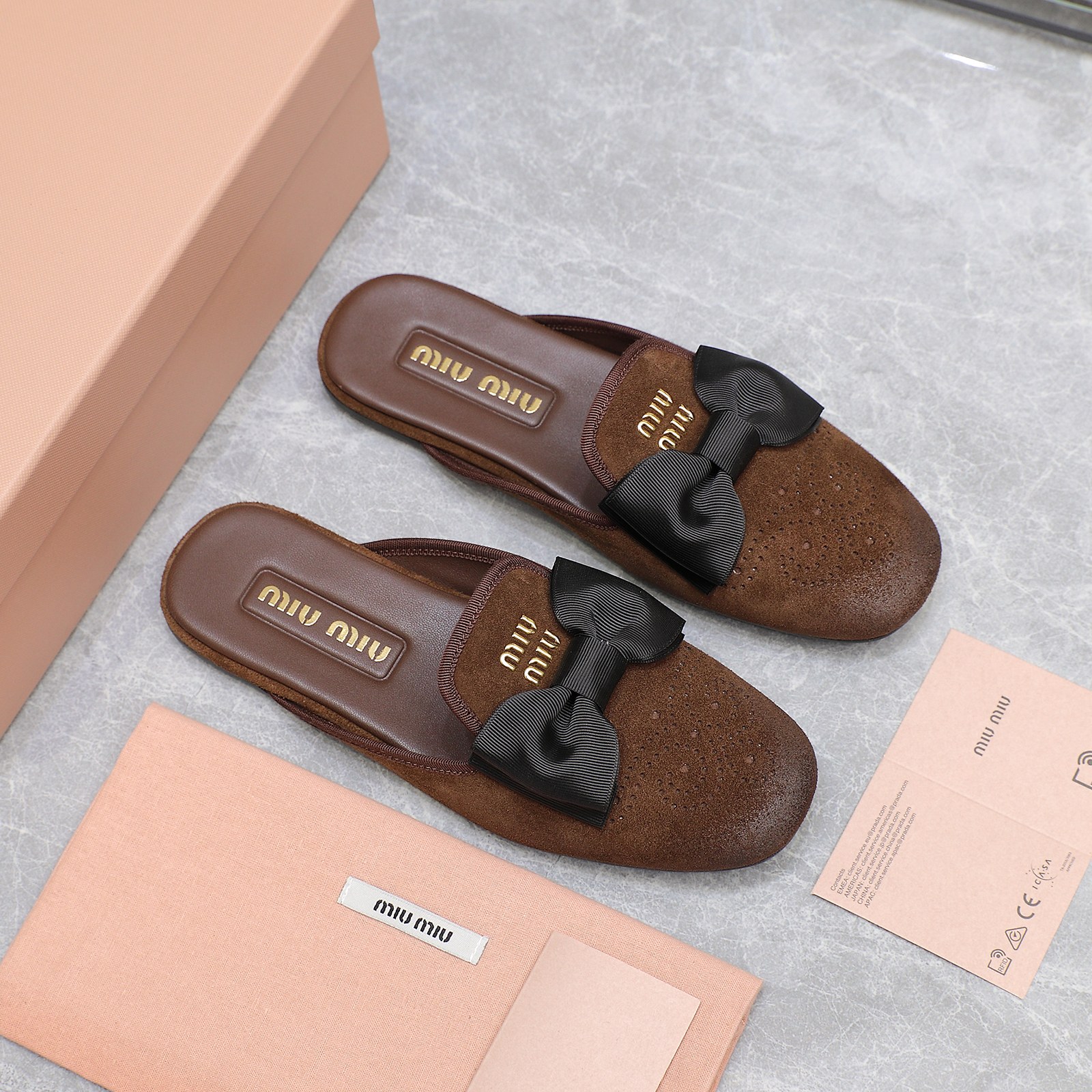 Miu Miu Bow-Embellished Suede Loafer Mules: Elegant and Comfortable 2 a1736428827375 1077